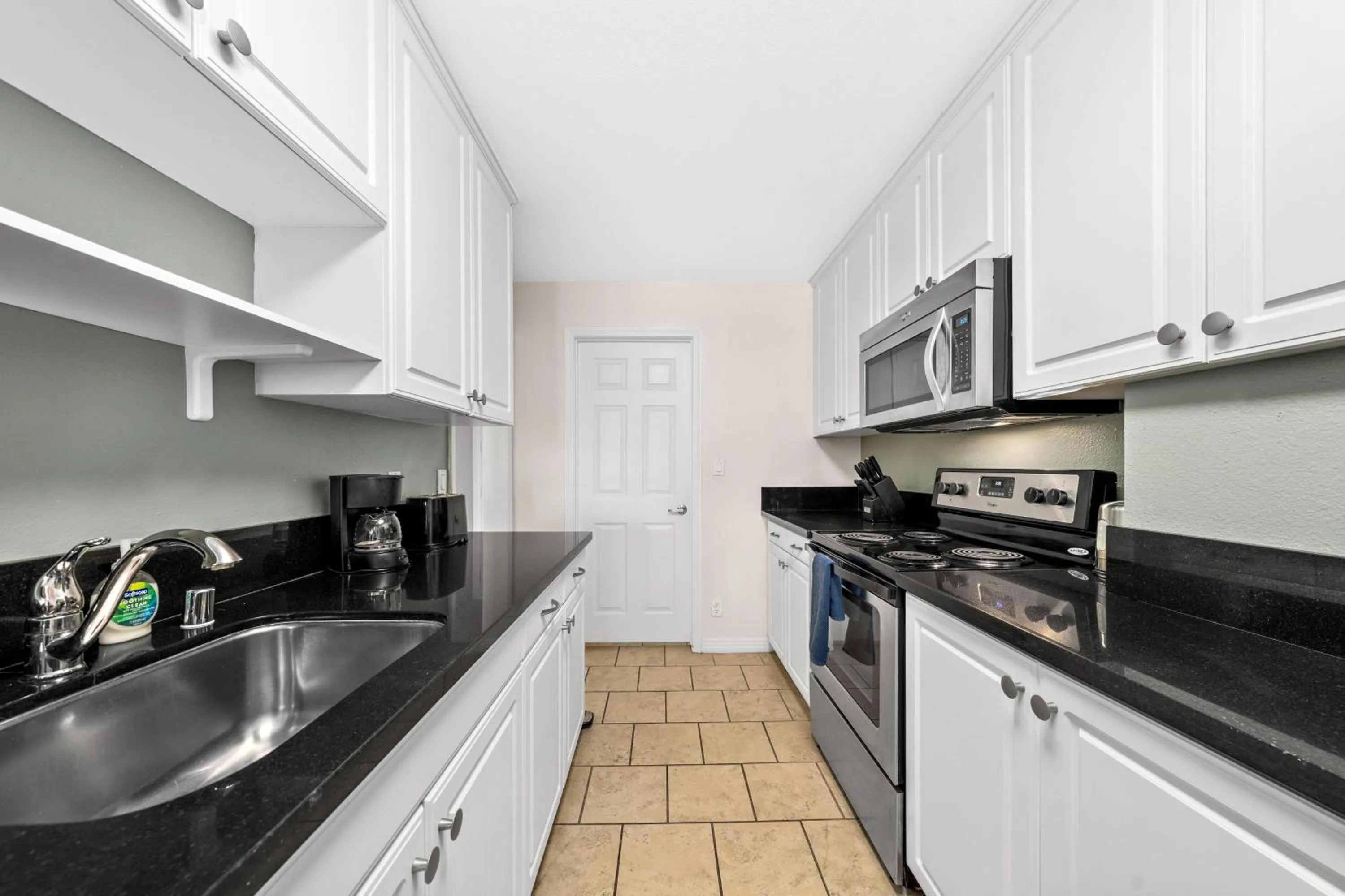 Kitchen or kitchenette in The tulip Marina Highrise with ocean view
