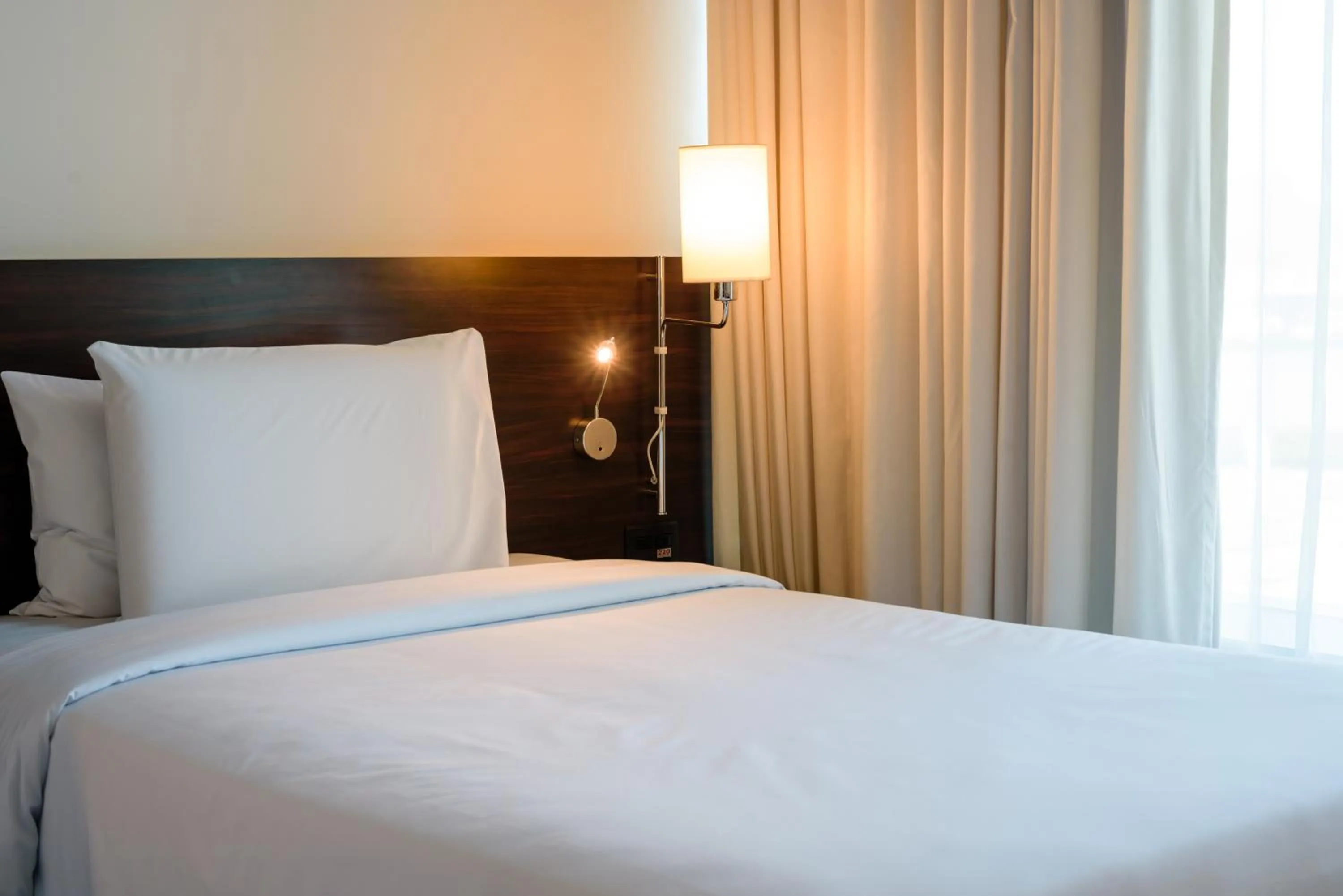 Bed in Lagune Barra Hotel