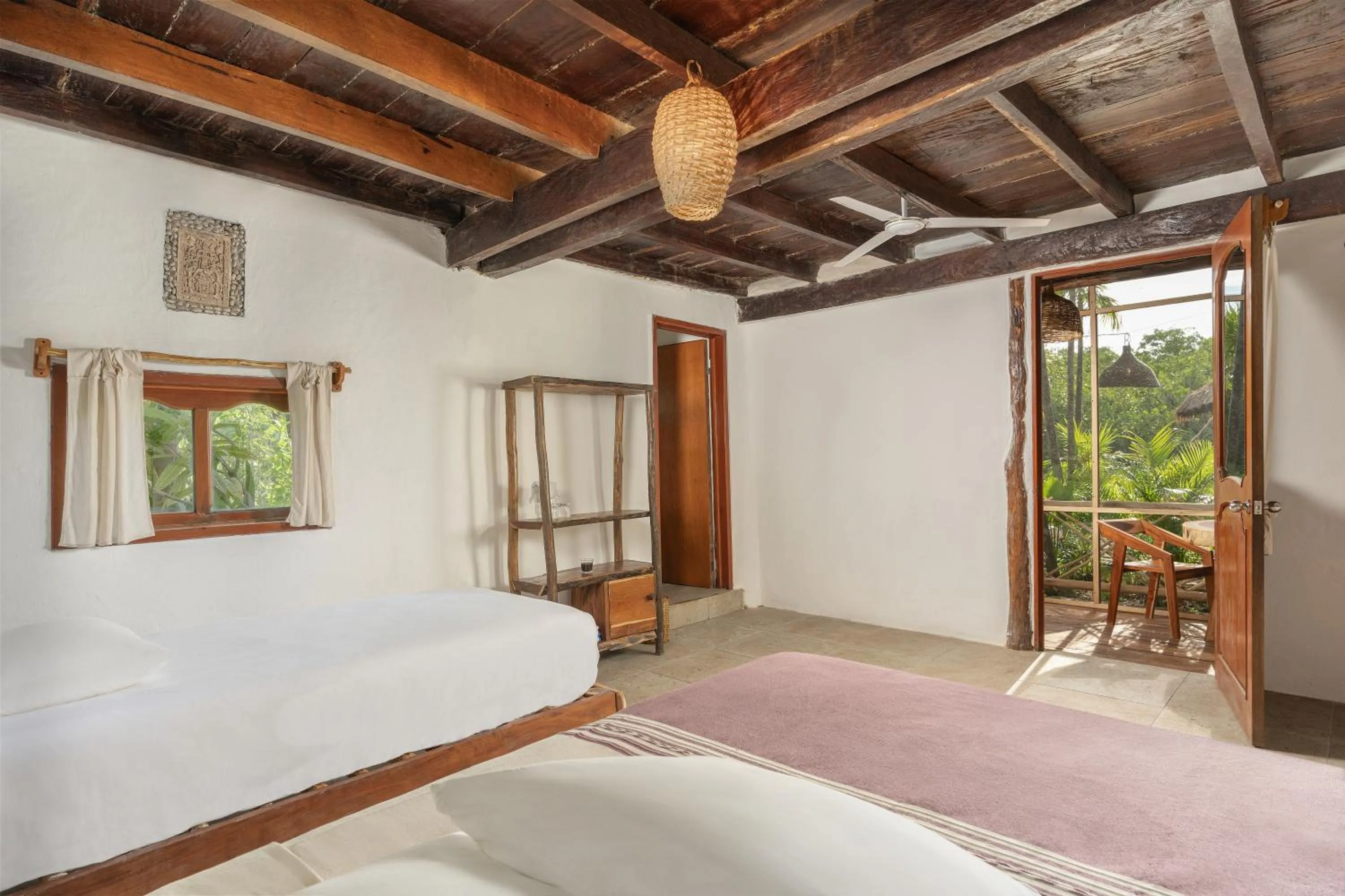 Bed in Yaxchen Tulum Cabañas & Cenote