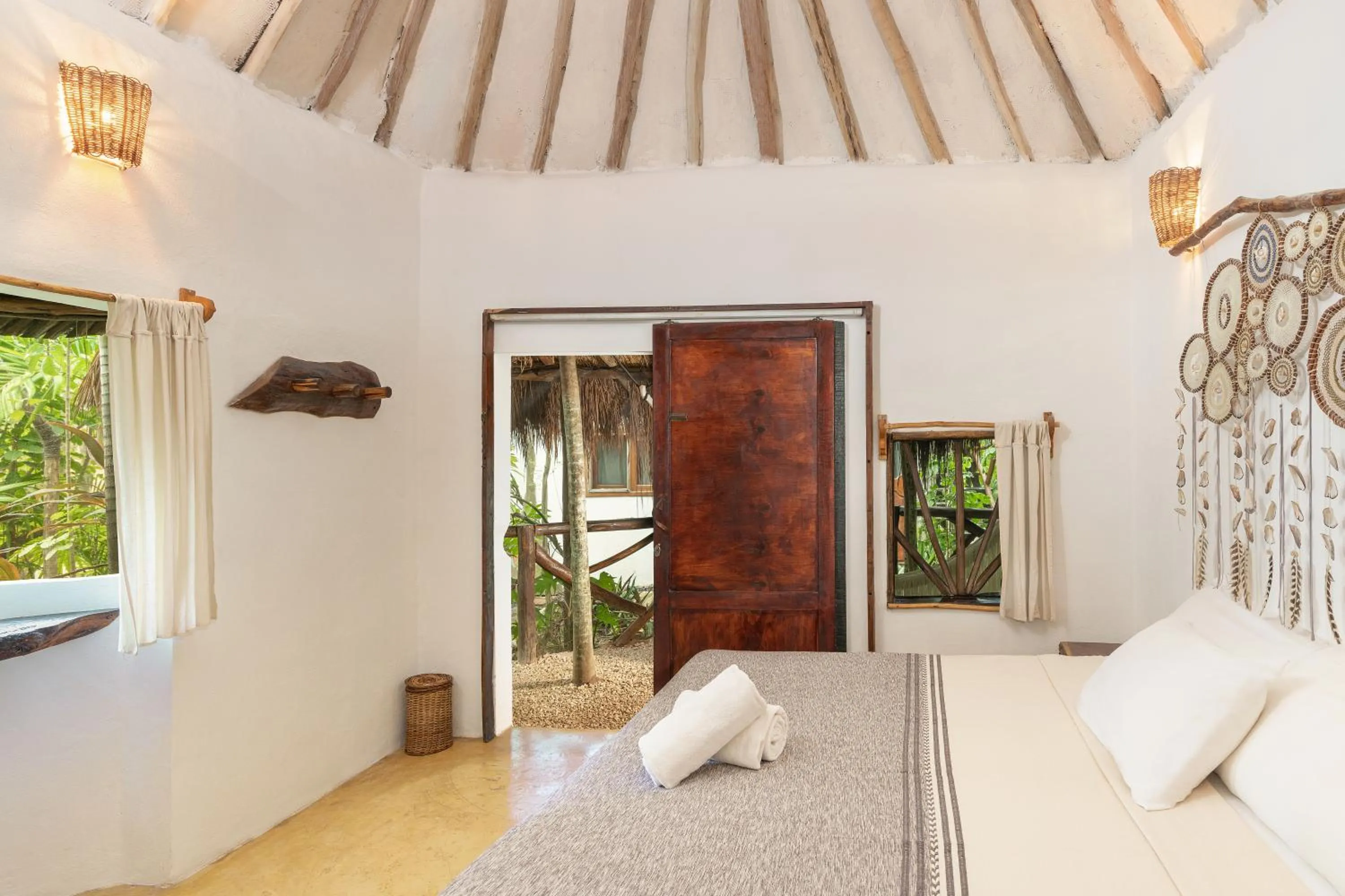 Photo of the whole room, Bed in Yaxchen Tulum Cabañas & Cenote