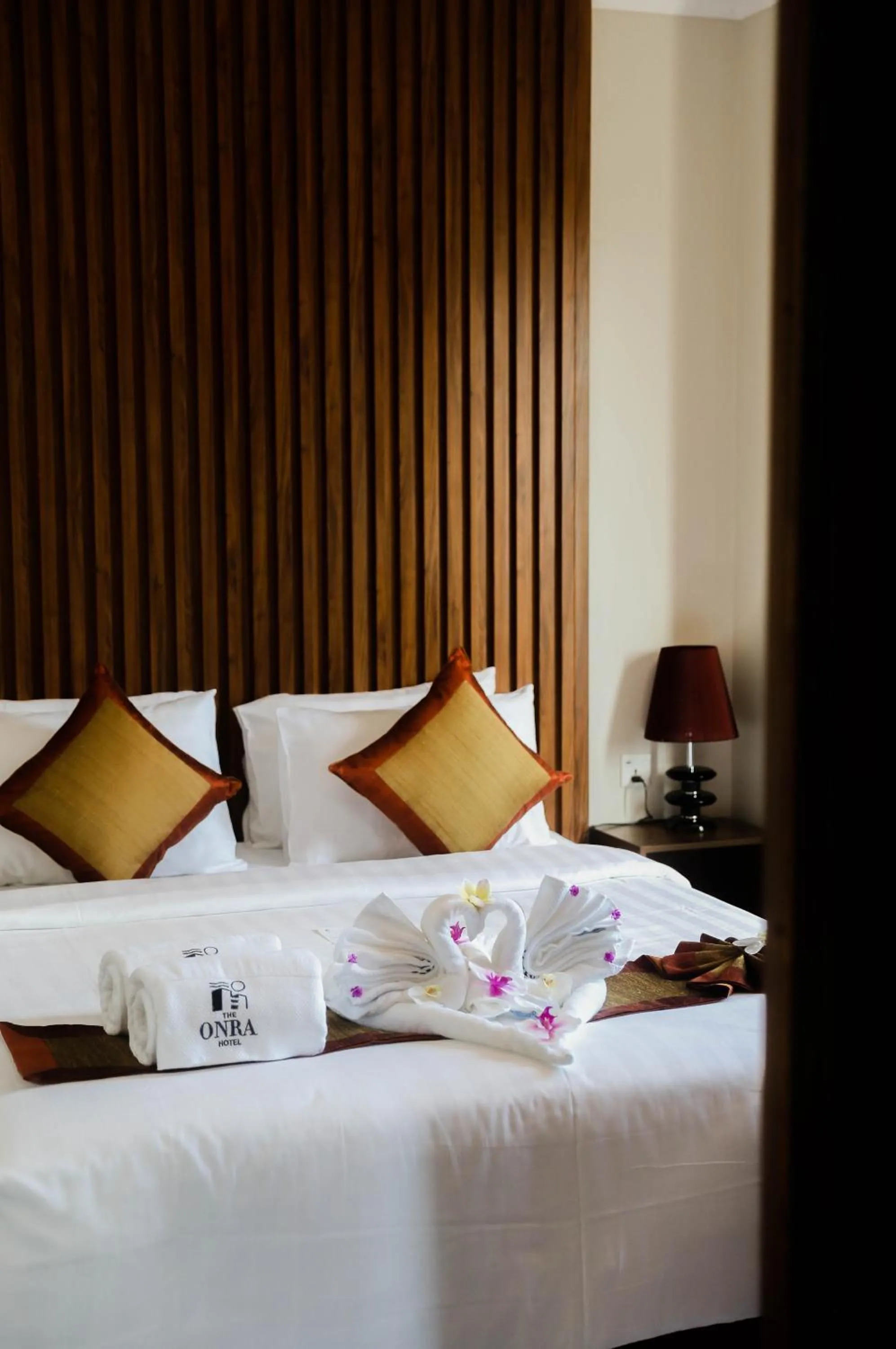 Bed in The ONRA Hotel