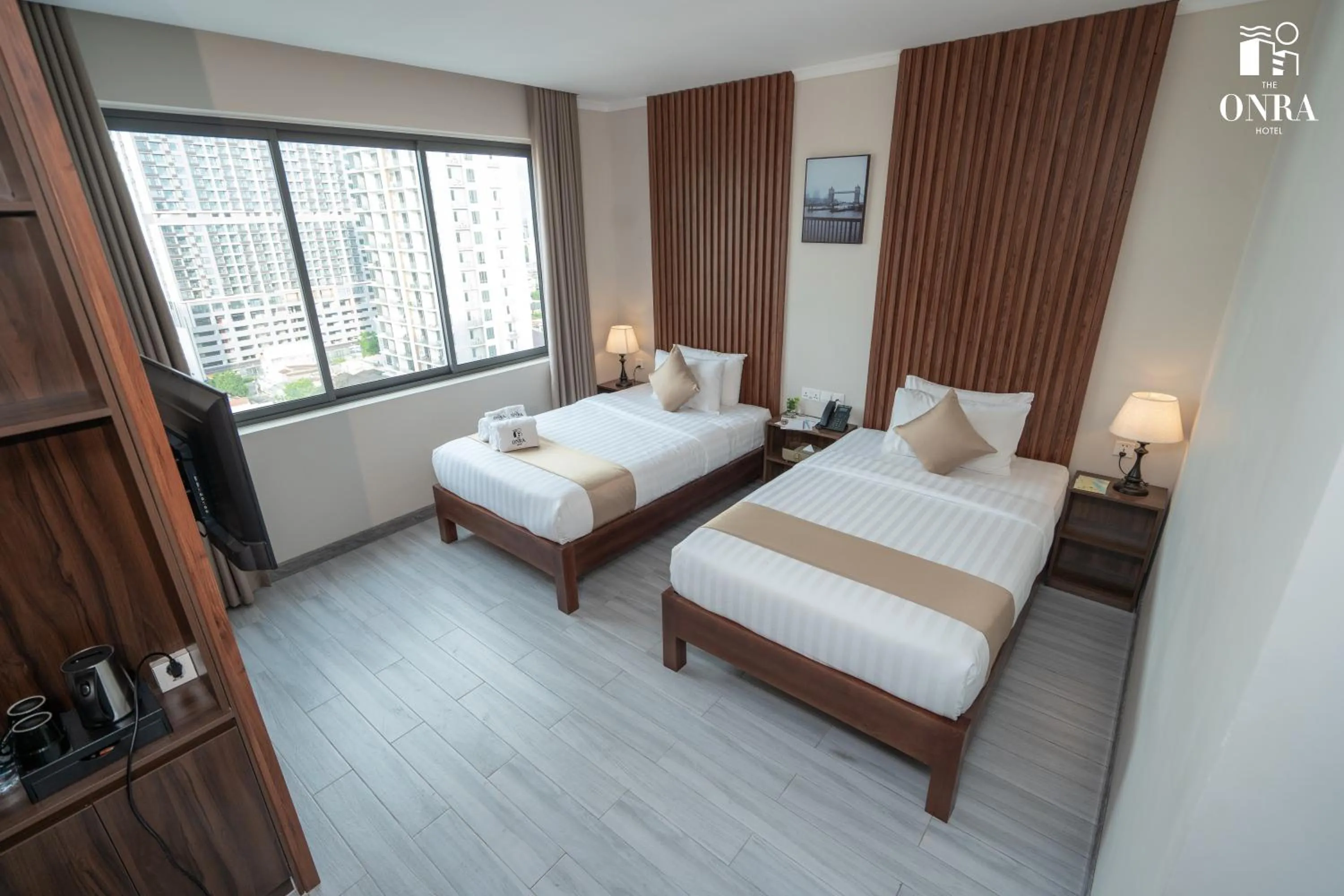 Bed in The ONRA Hotel