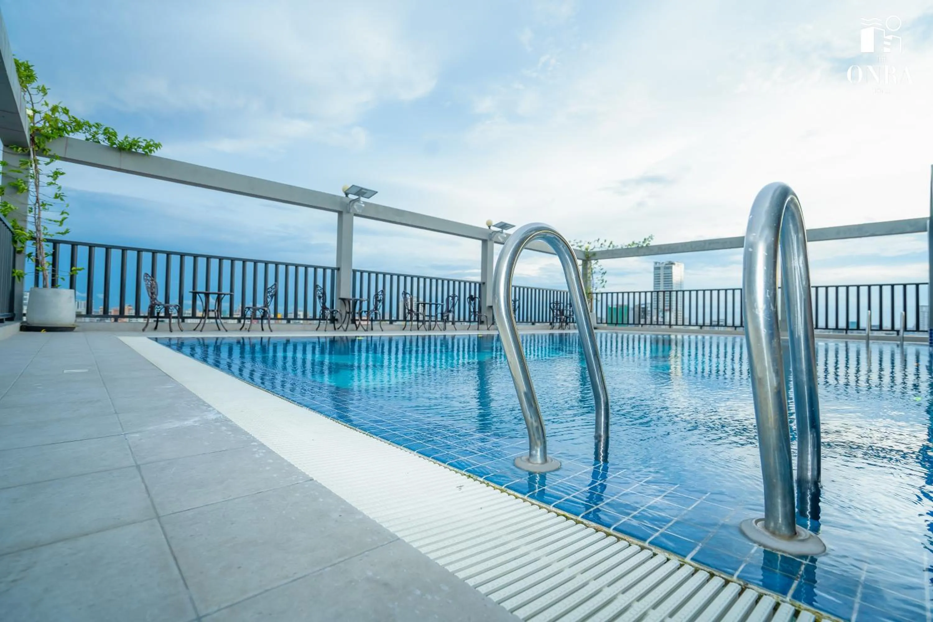 Swimming pool in The ONRA Hotel