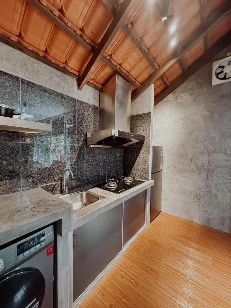 Kitchen or kitchenette in Royale Riviera Resort Private Pool Villas