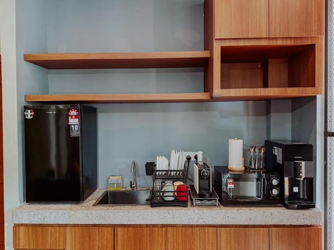 Kitchen or kitchenette in Royale Riviera Resort Private Pool Villas