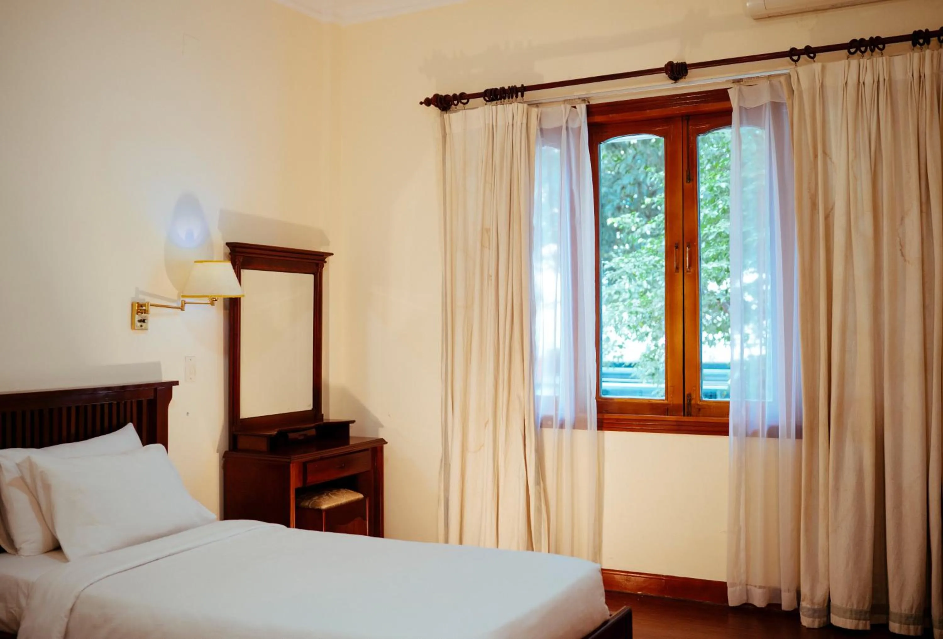 Bed in Mercury Hotel & Apartment