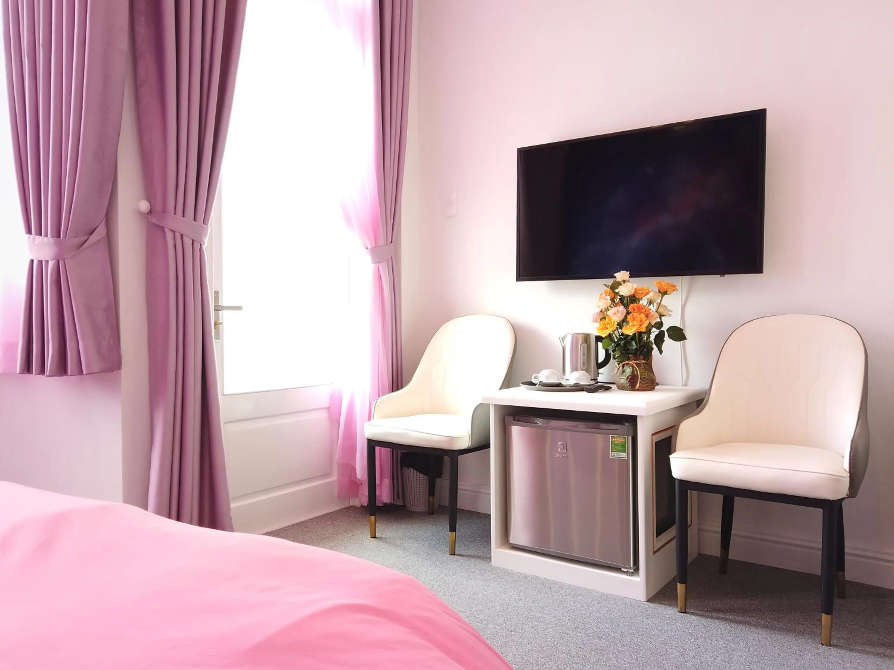 Communal lounge/ TV room, Bed in Free Style Hotel Dalat