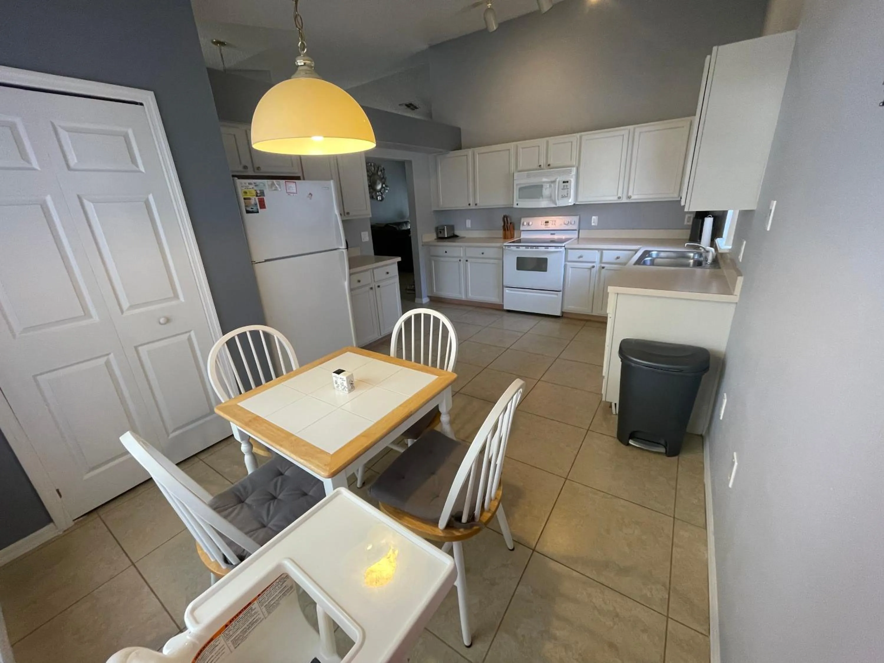 Kitchen or kitchenette in 3 Bedroom Villa with Poolside Cinema and Games Room Close to theme Parks sleeps 6 plus 2