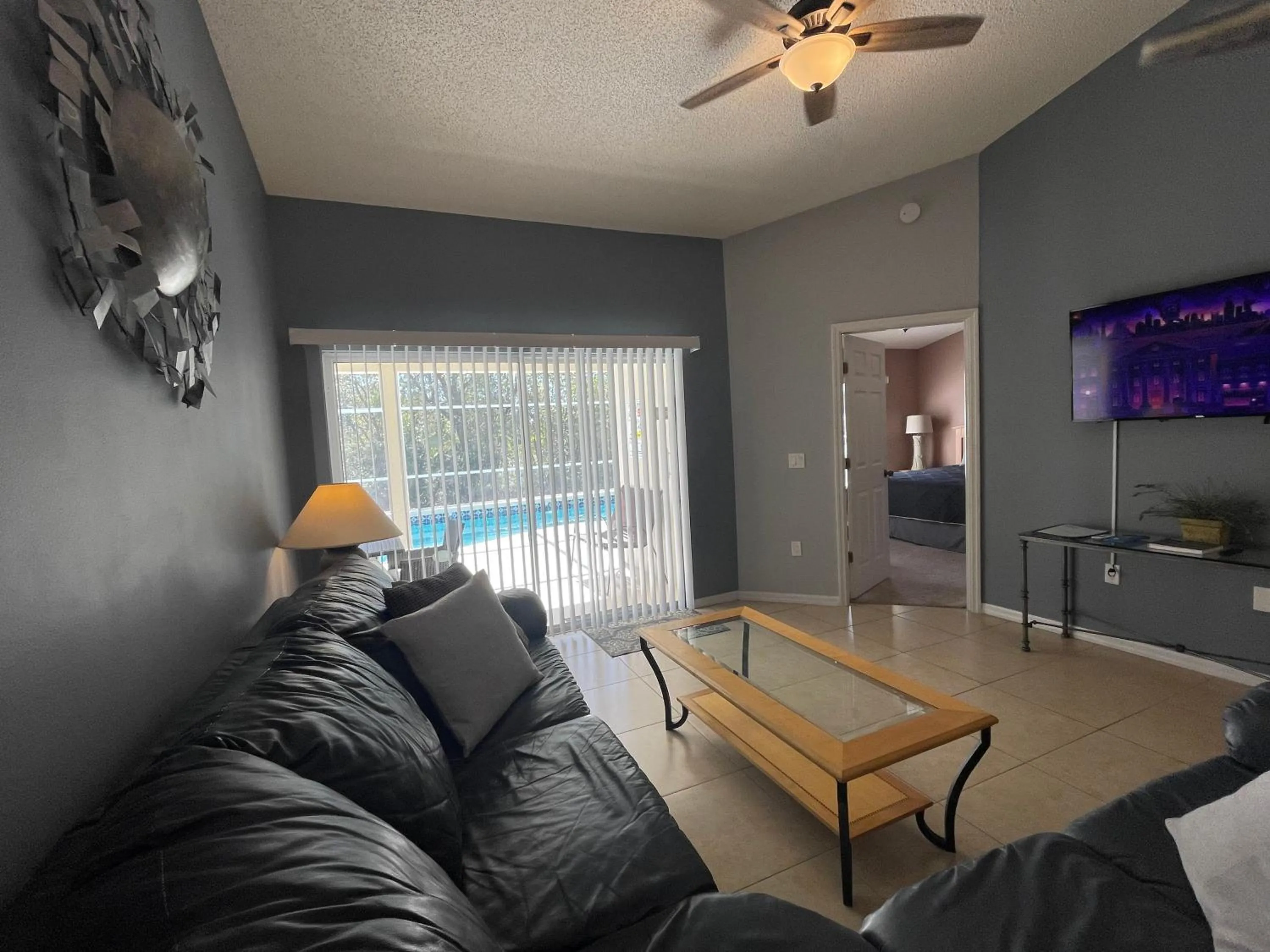 Living room in 3 Bedroom Villa with Poolside Cinema and Games Room Close to theme Parks sleeps 6 plus 2