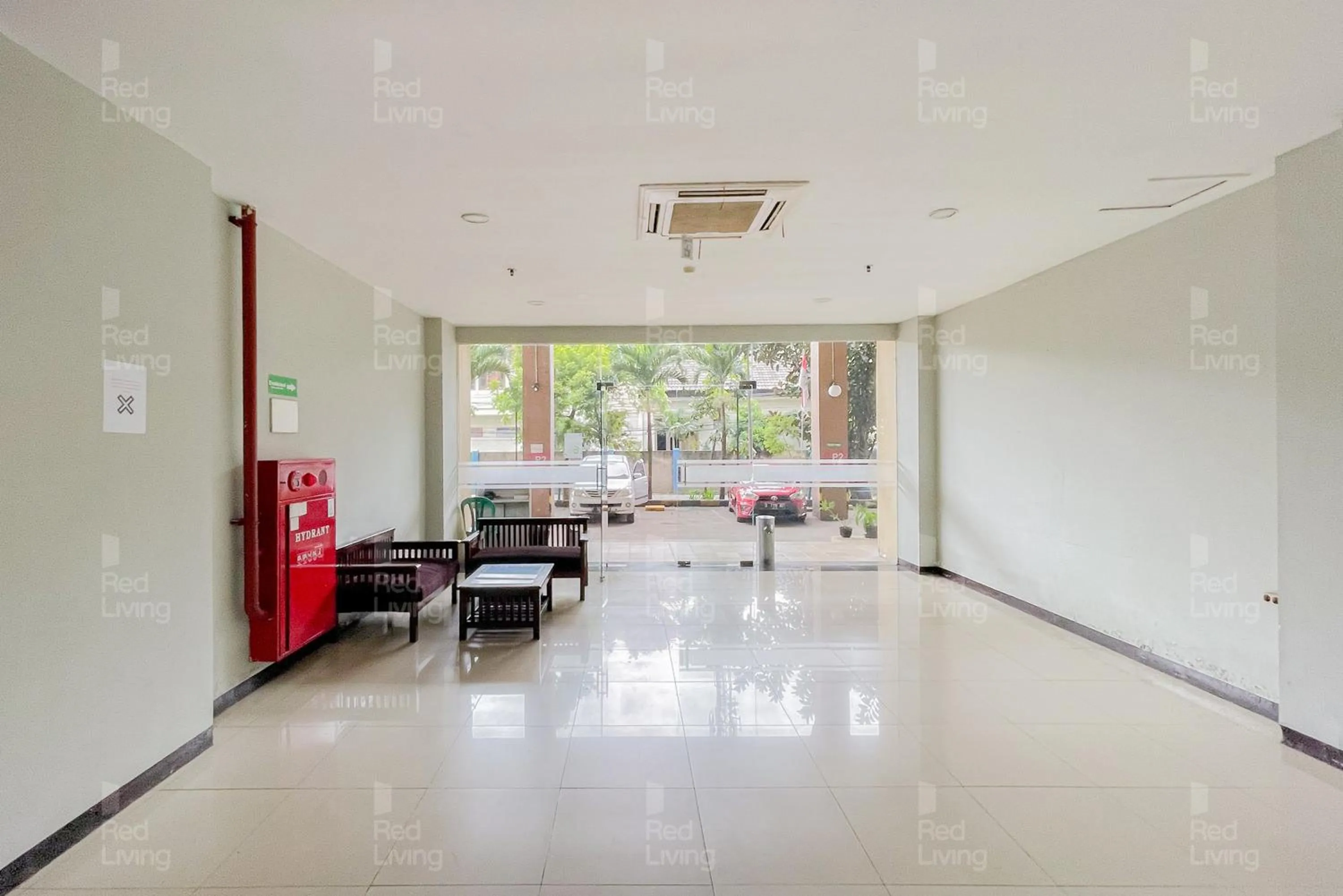 Living room in RedLiving Apartemen Tamansari Panoramic - Santuy Agency