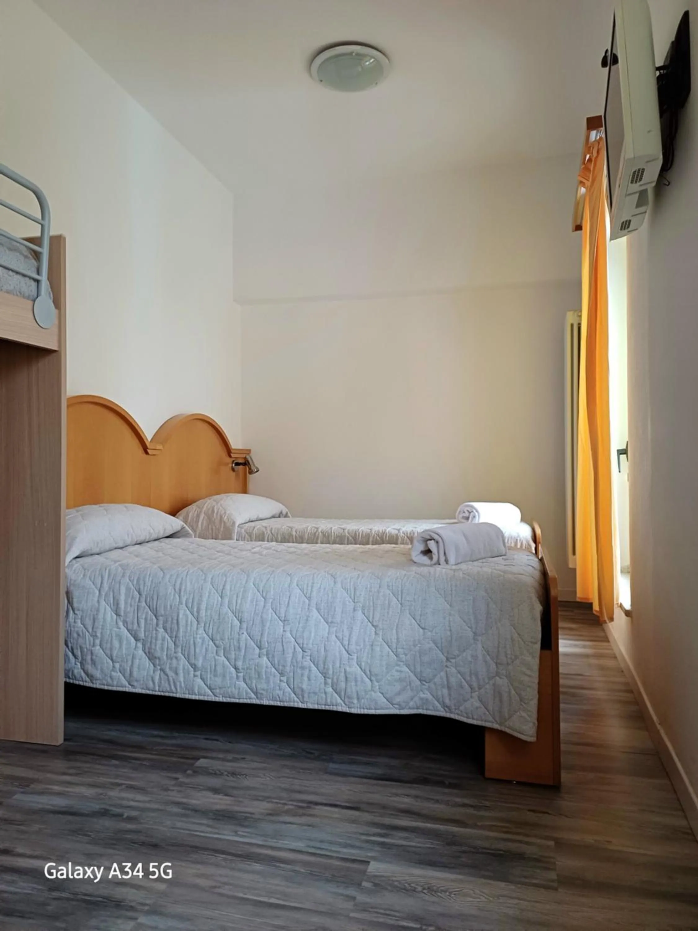 Bed in AlmaMed Hotel san Leonardo