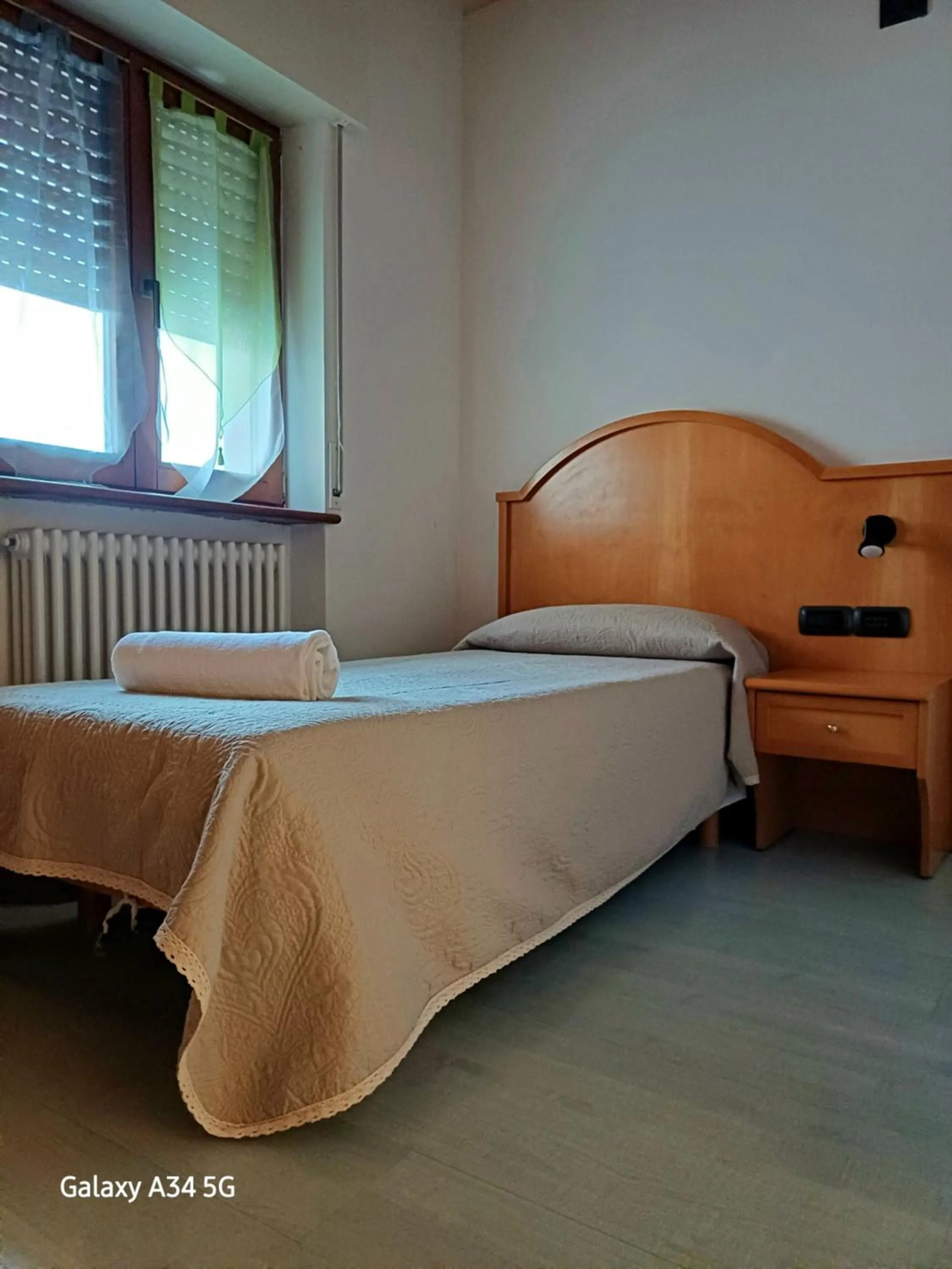 Bed in AlmaMed Hotel san Leonardo
