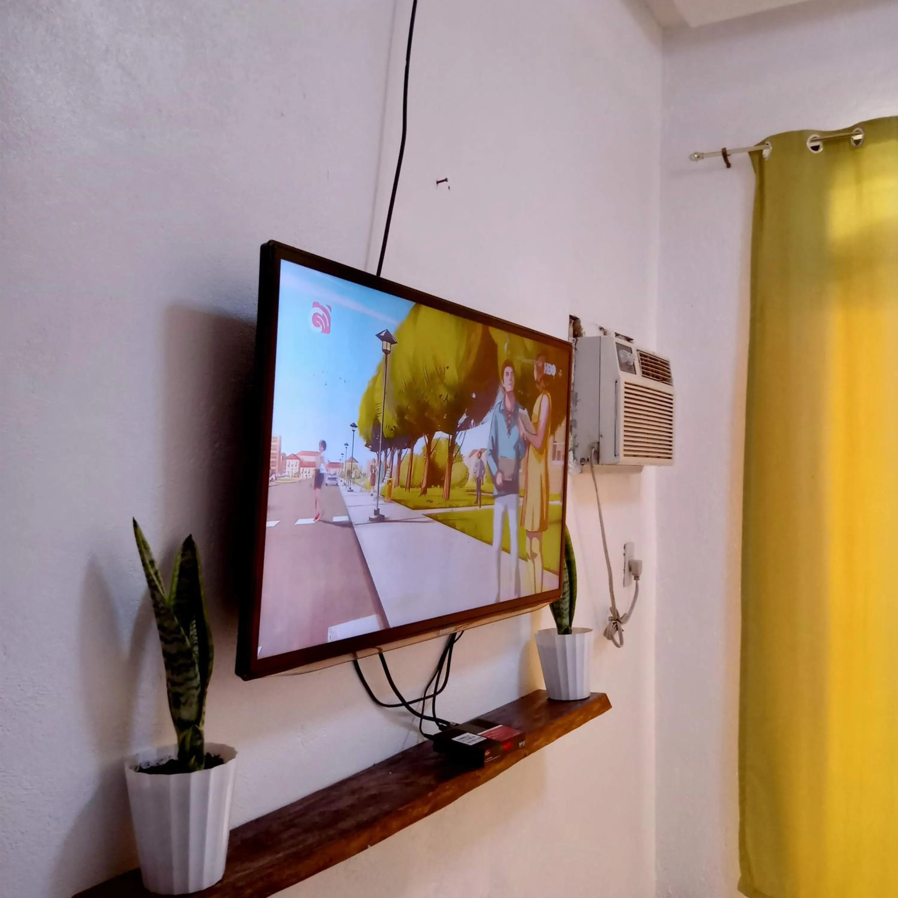 TV and multimedia in Baywalk Suites Batangas