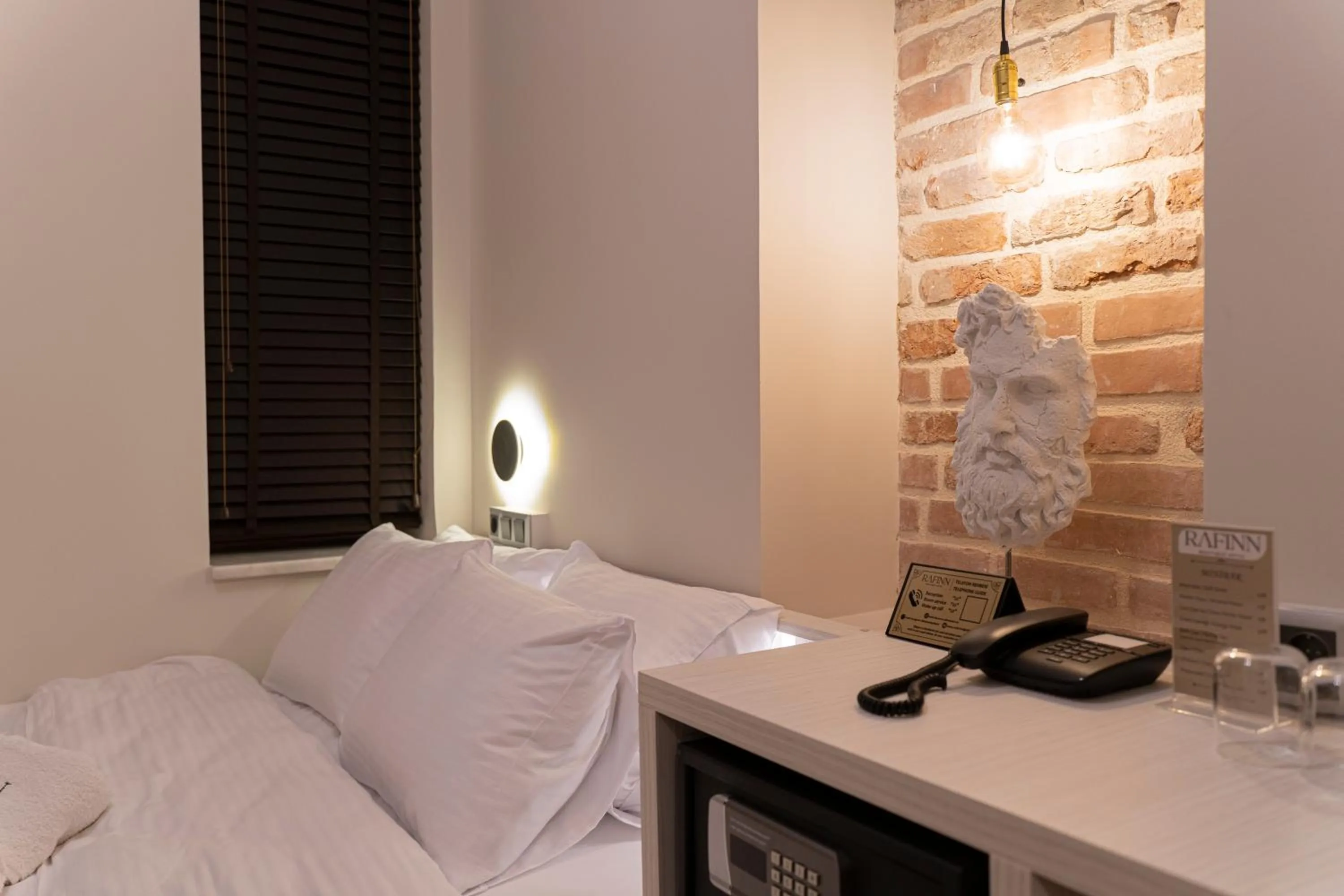 Decorative detail, Bed in Rafinn Hotel