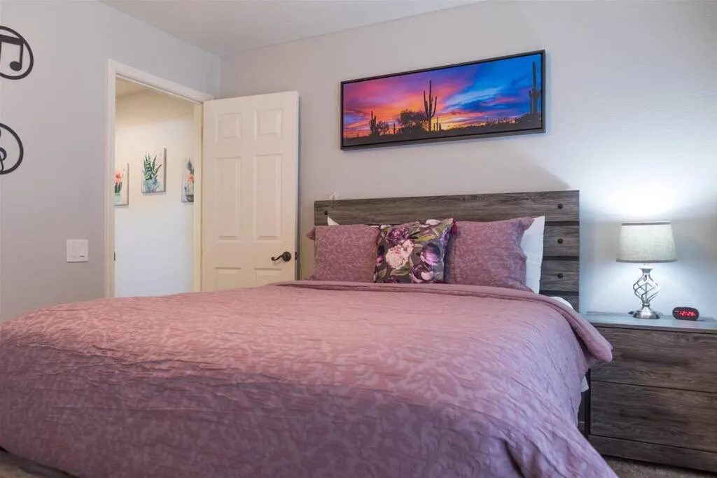 Bed in Cozy home with pool, fire table, BBQ, RV parking