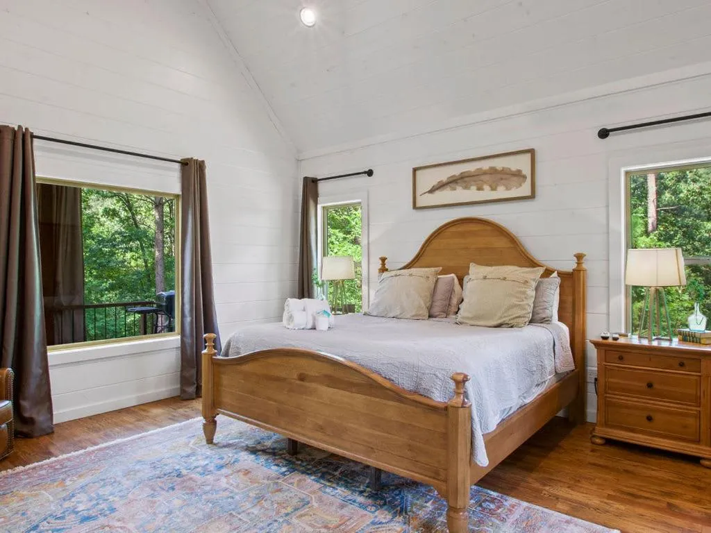Bed in Stunning Luxury Cabin w Hot Tub and Fire Pit Holy Shiplap is Perfect Romantic Couples Getaway