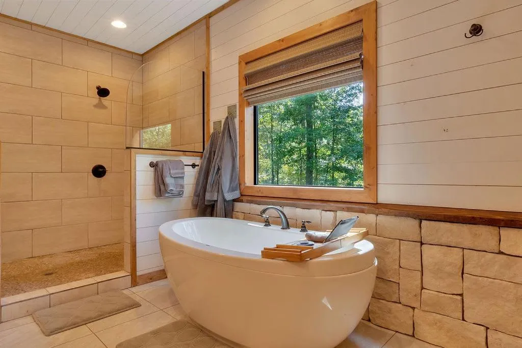 Gorgeous Idyllic Cabin w Hot Tub and Fire Pit Quittin Time is Secluded Romantic Oasis w Luxury Bathroom Double Shower and Bathtub Foosball Table