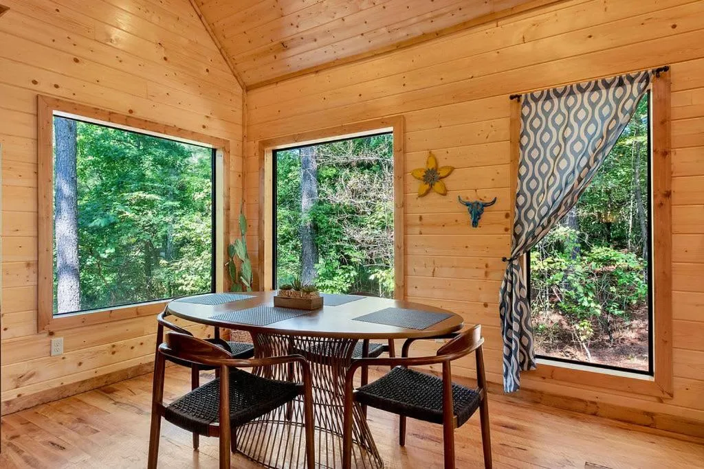 Gorgeous Idyllic Cabin w Hot Tub and Fire Pit Quittin Time is Secluded Romantic Oasis w Luxury Bathroom Double Shower and Bathtub Foosball Table