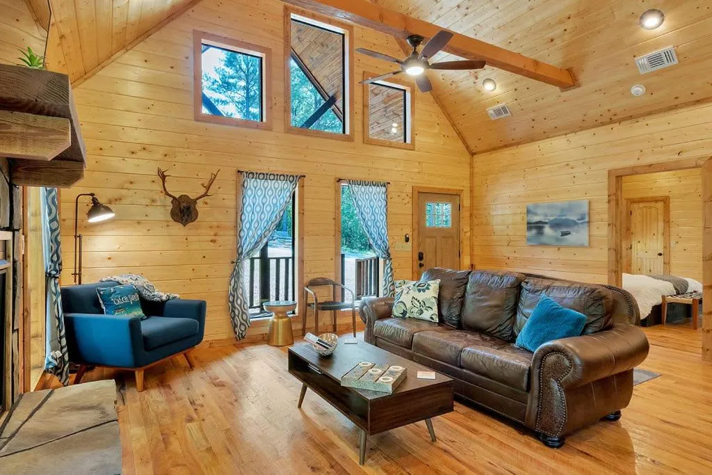 Gorgeous Idyllic Cabin w Hot Tub and Fire Pit Quittin Time is Secluded Romantic Oasis w Luxury Bathroom Double Shower and Bathtub Foosball Table