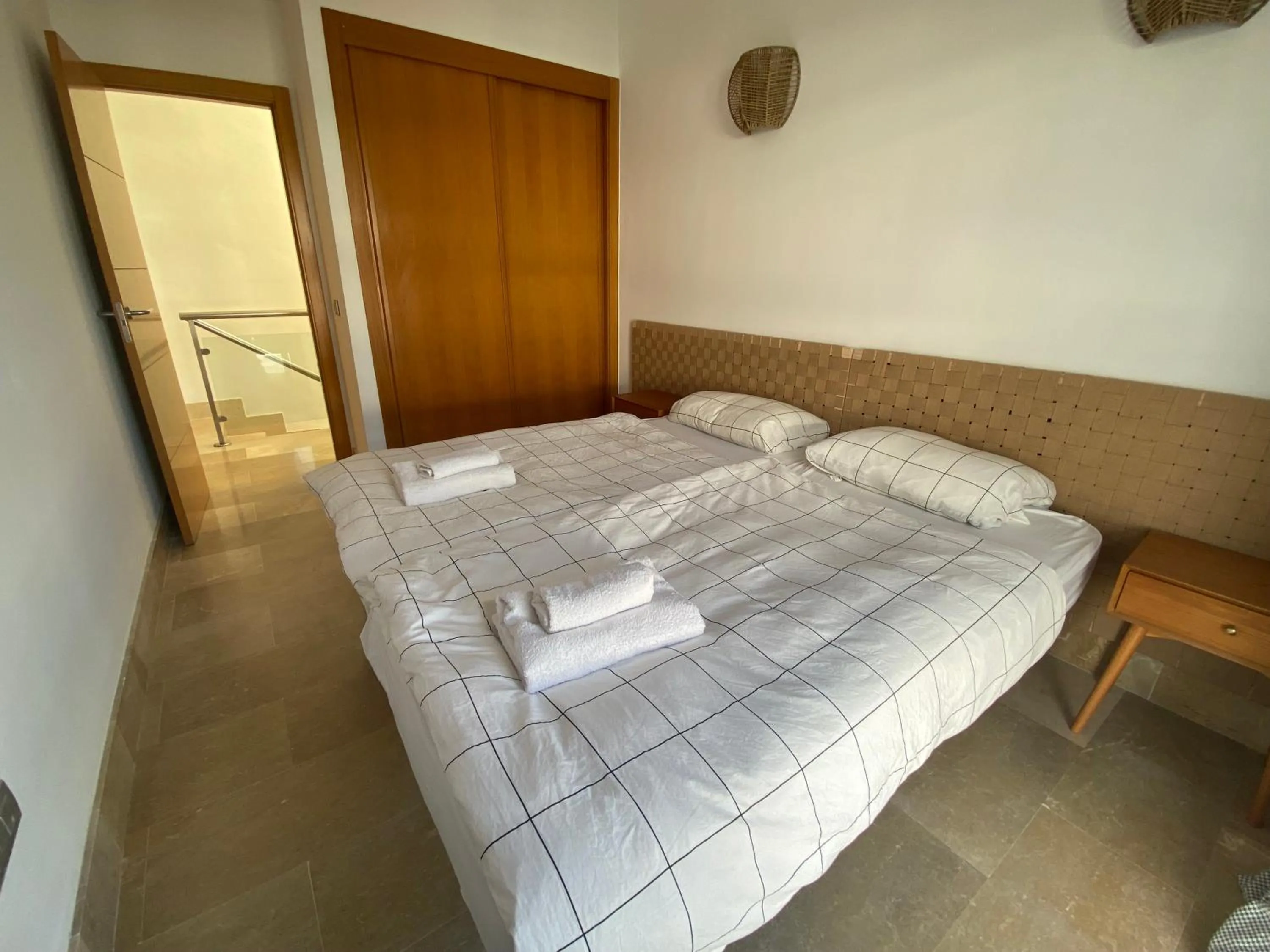 Bed in SUN BAY VILLAS APARTMENT