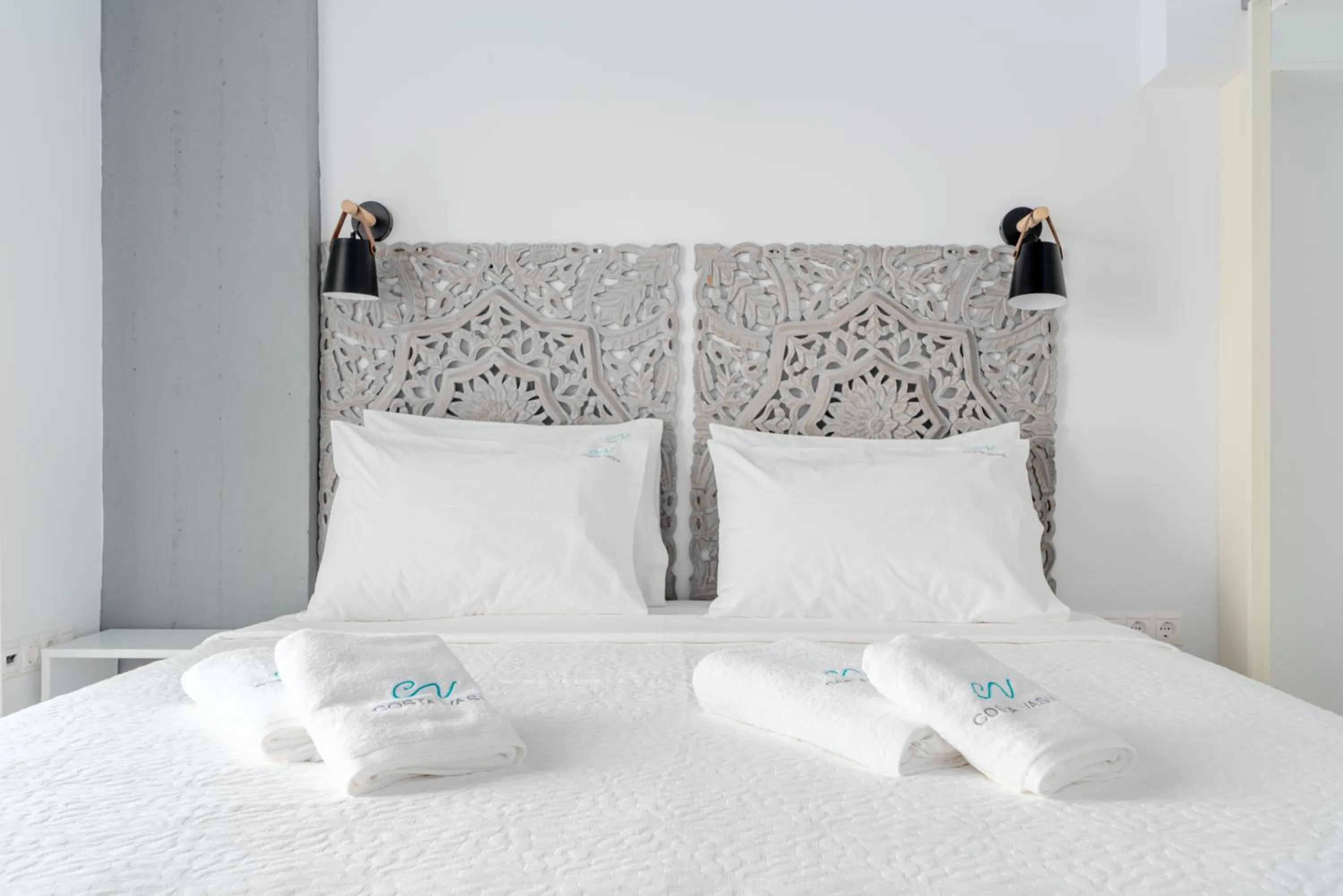 Bed in COSTA VASIA Boutique Apartments