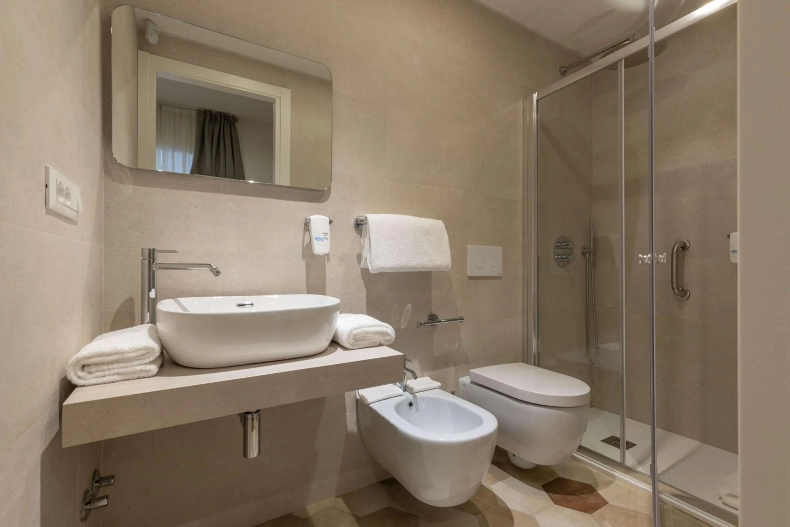 Bathroom in Cosmopolita Rome Colosseum, Tapestry Collection by Hilton