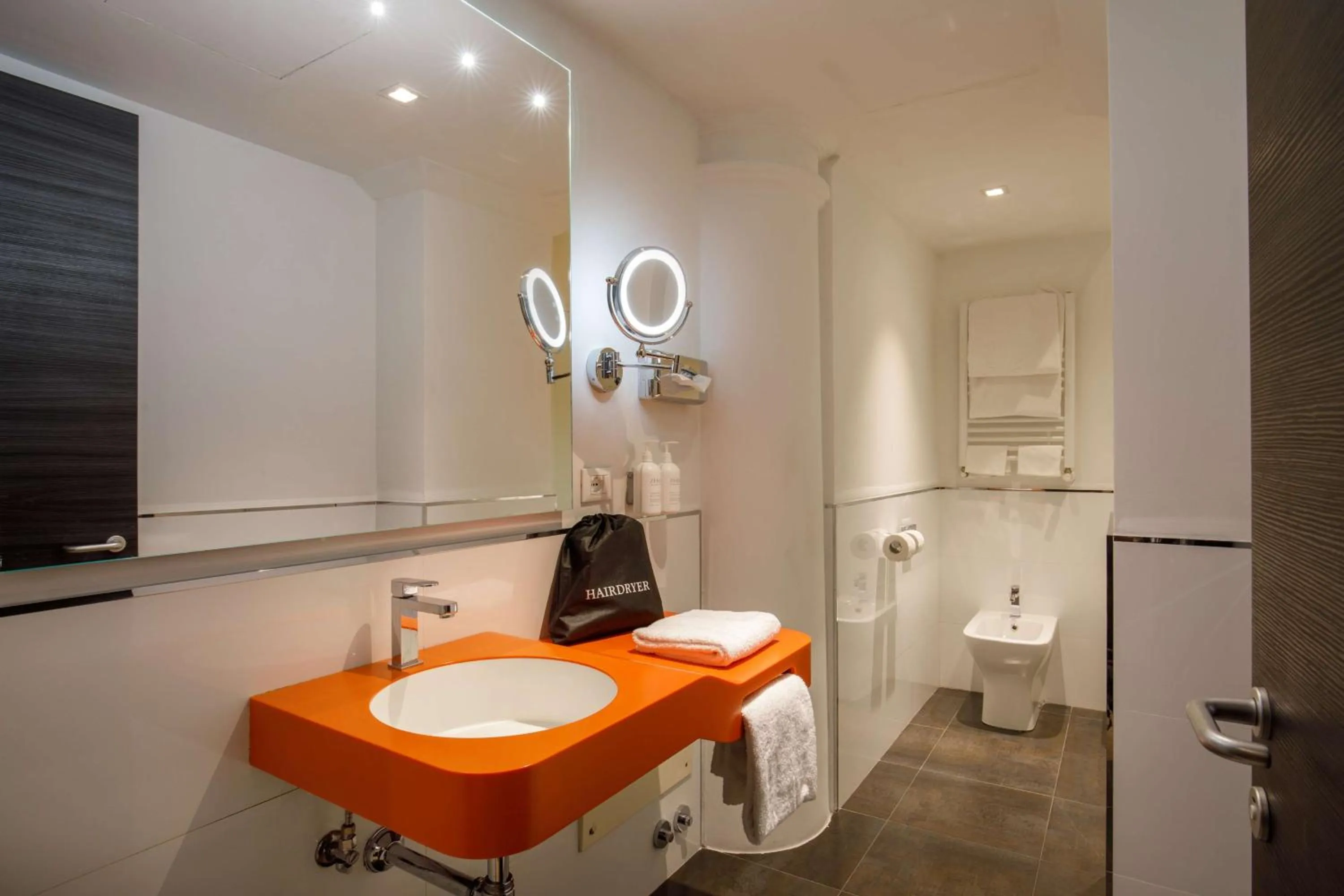 Bathroom in Cosmopolita Rome Colosseum, Tapestry Collection by Hilton