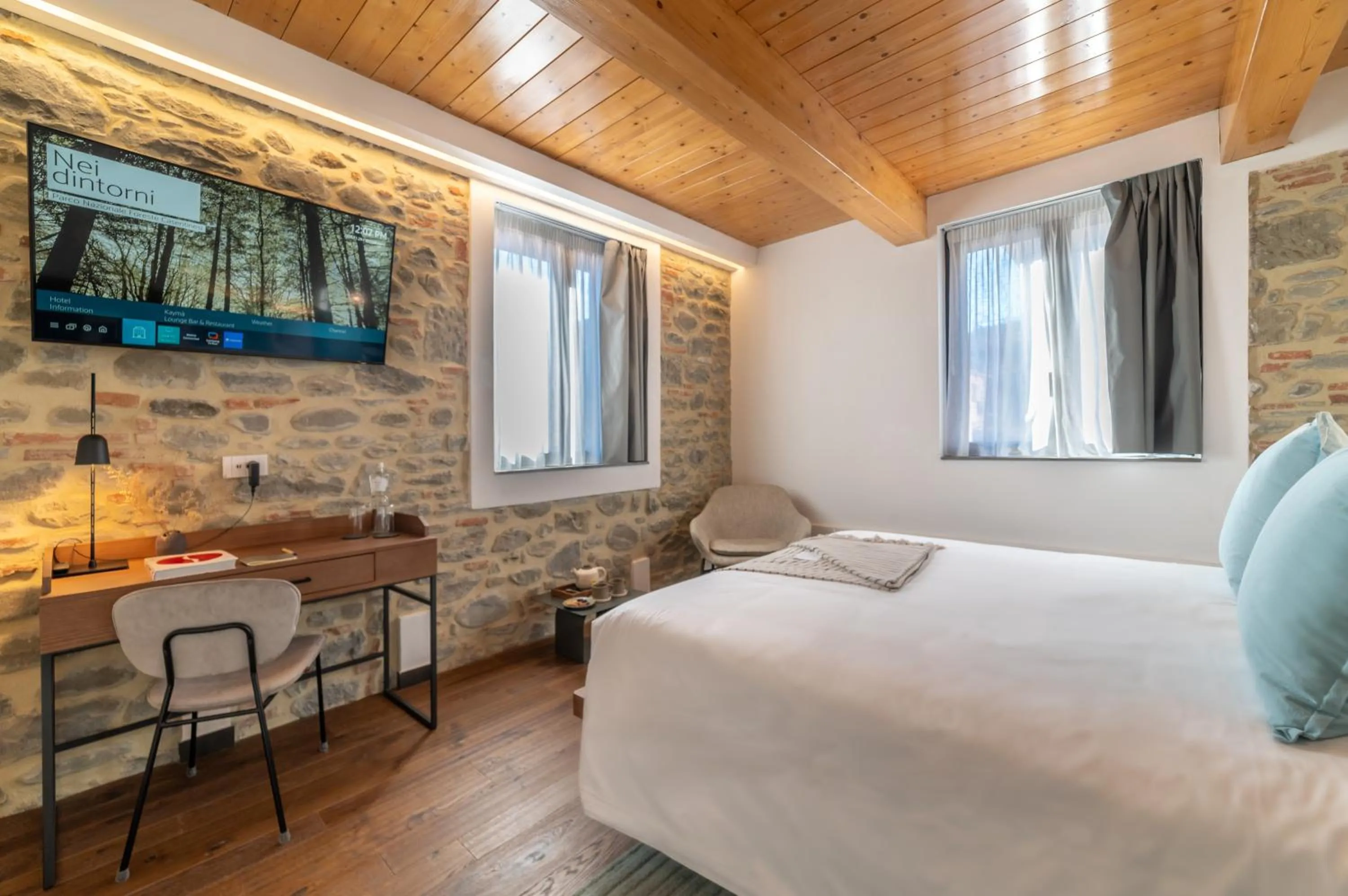 Photo of the whole room, Bed in Via Roma 33 Tuscany Boutique Hotel & Spa - Adults Only