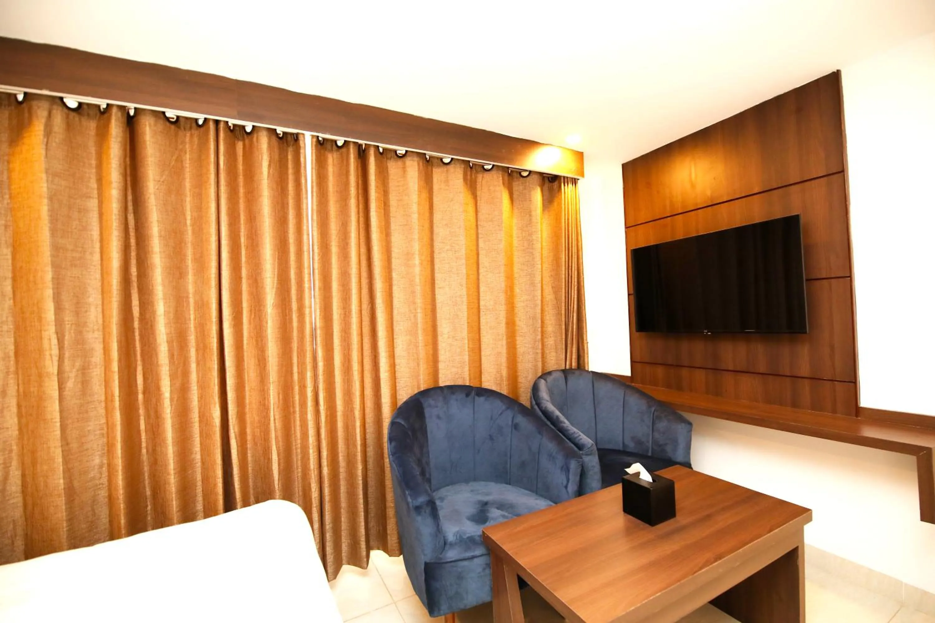Communal lounge/ TV room in Ashoka Resort Pvt. Ltd