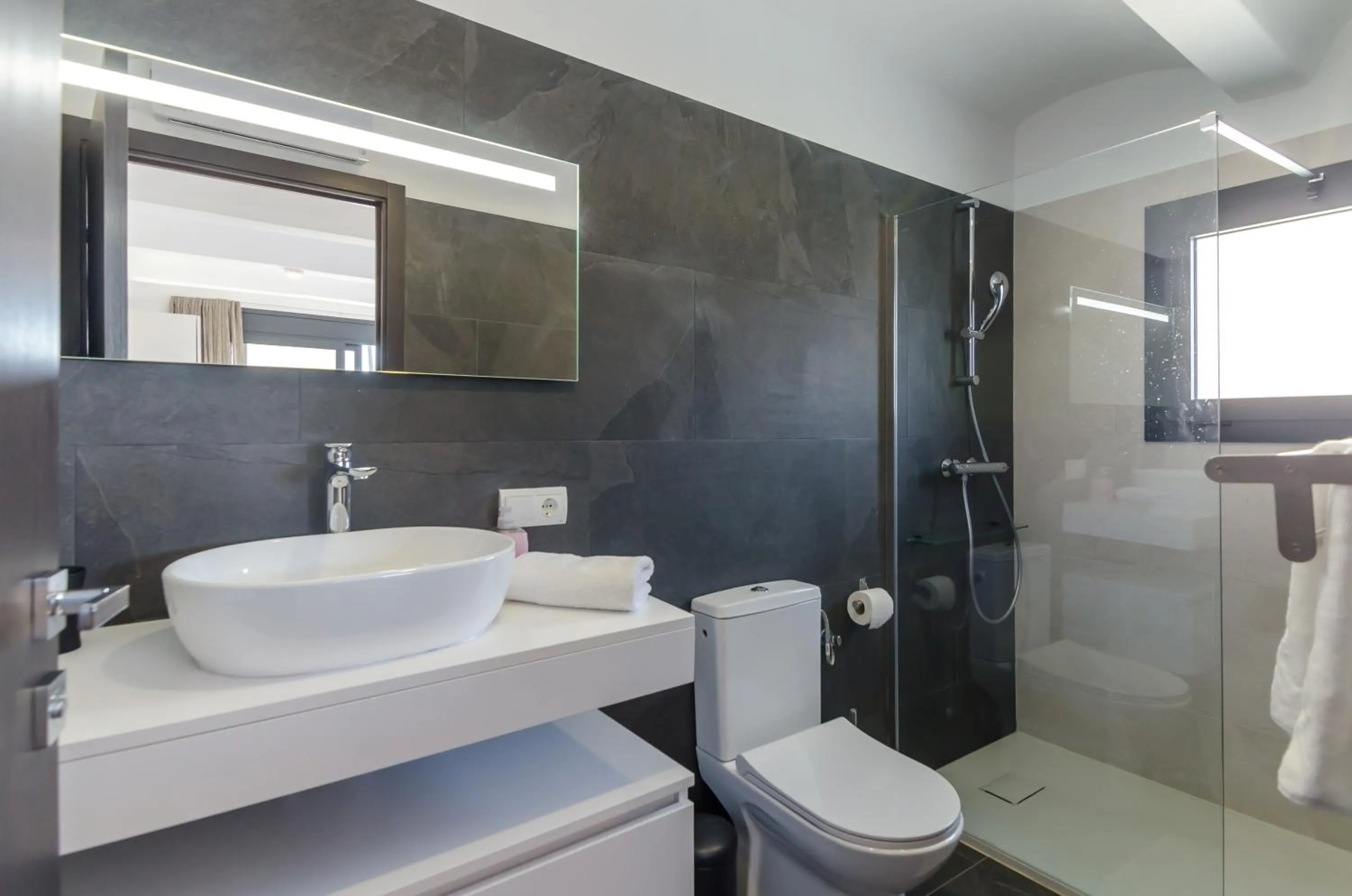 Bathroom in Seaside villa in Lloret de Mar with garden and pool view