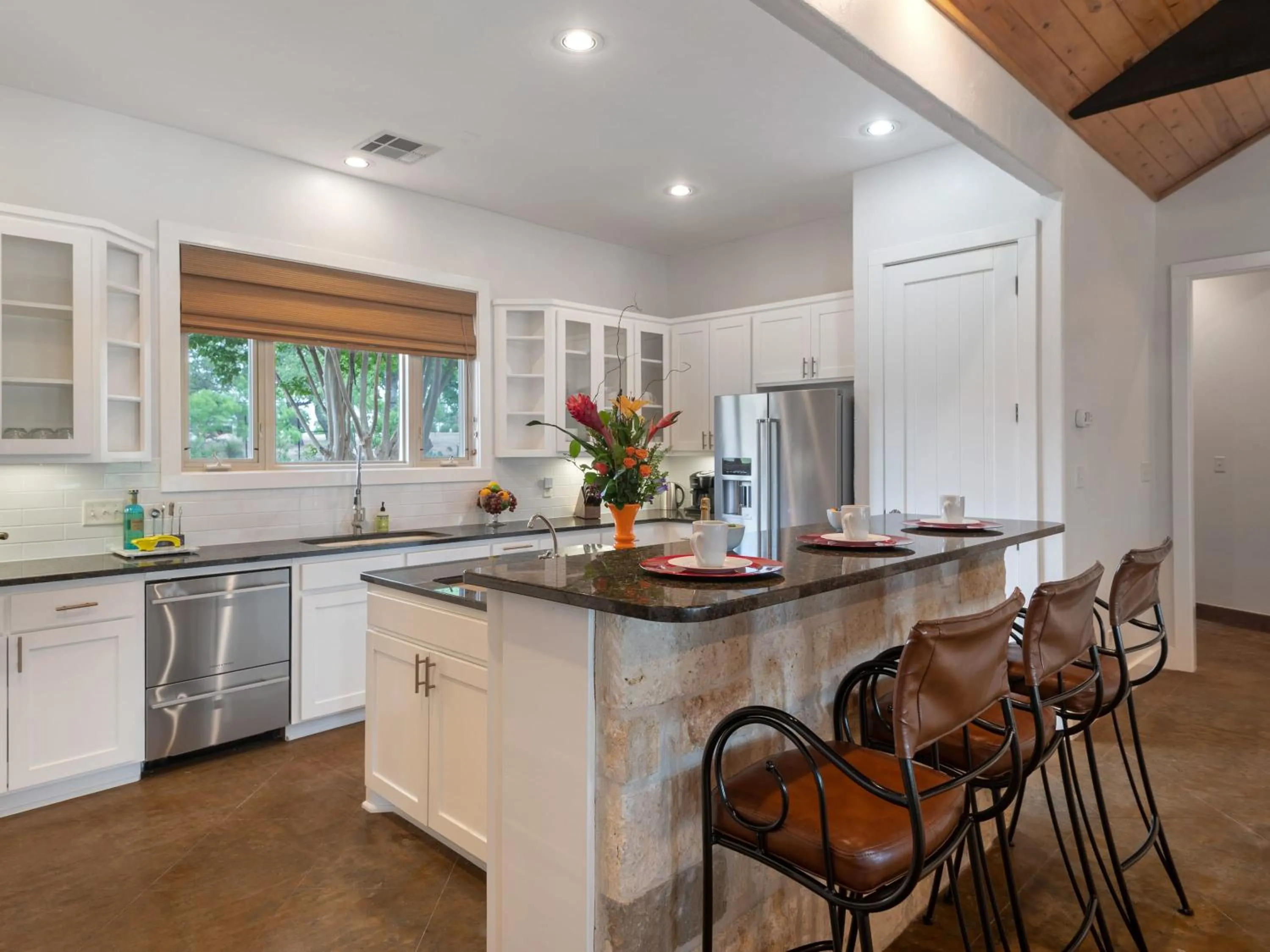 Waterfront Home with Boat Slip, Spacious Outdoor Patio and a Fenced Yard