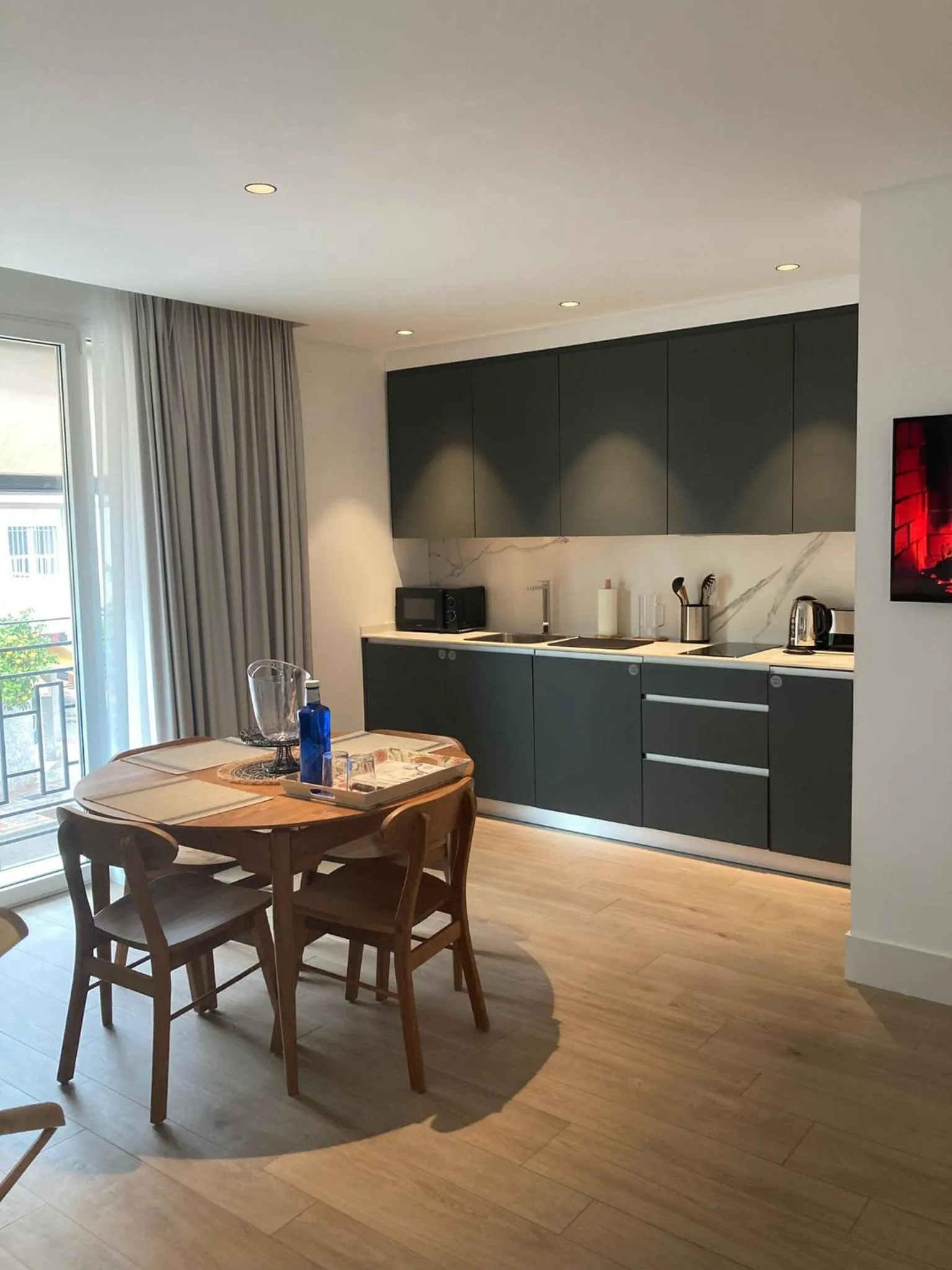 TV and multimedia in Apartamentos Turísticos La Plaza