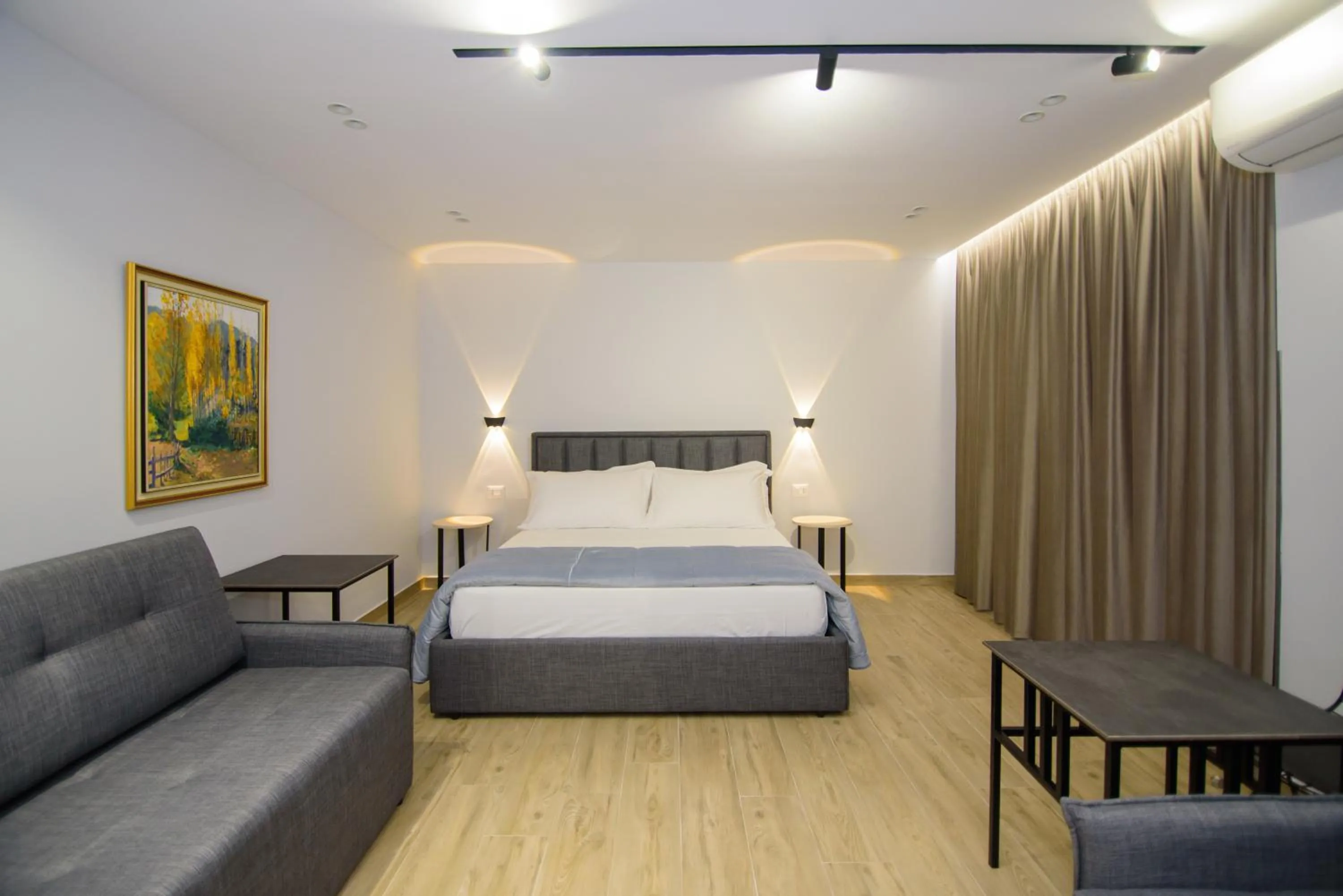 Bed in Palm Side Hotel