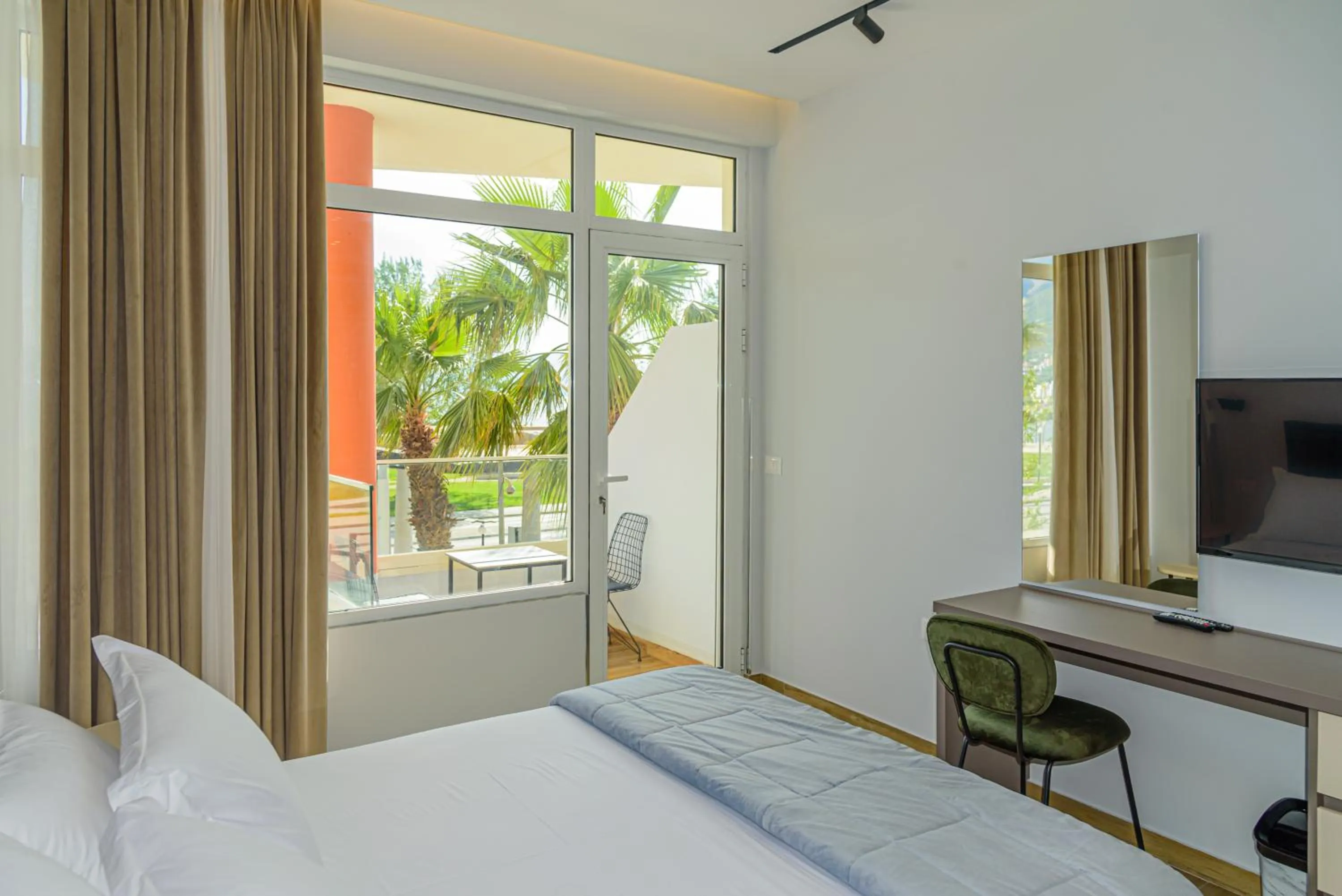 Bed in Palm Side Hotel