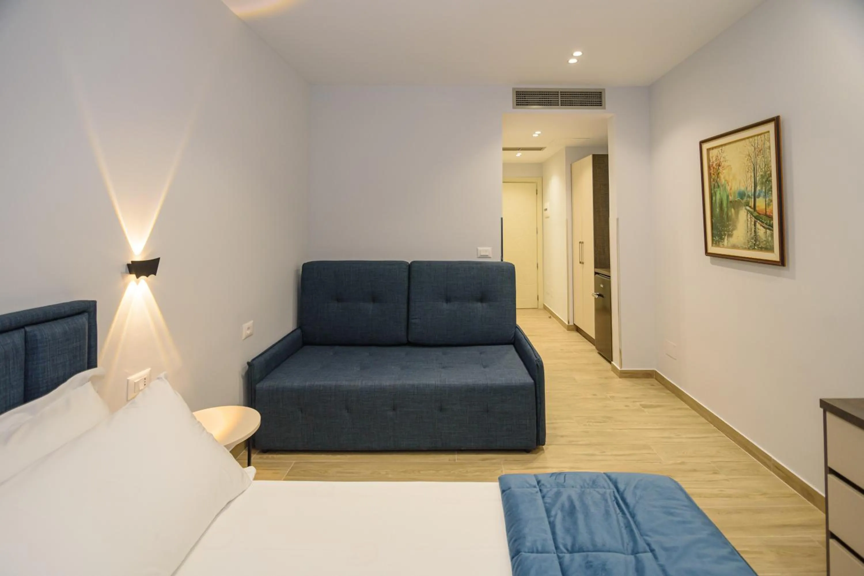 Living room in Palm Side Hotel