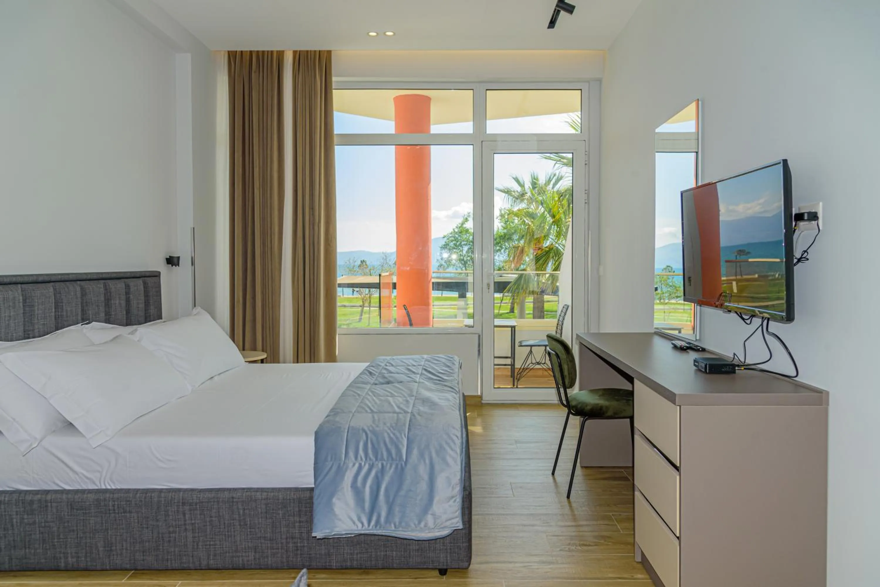 Bed in Palm Side Hotel