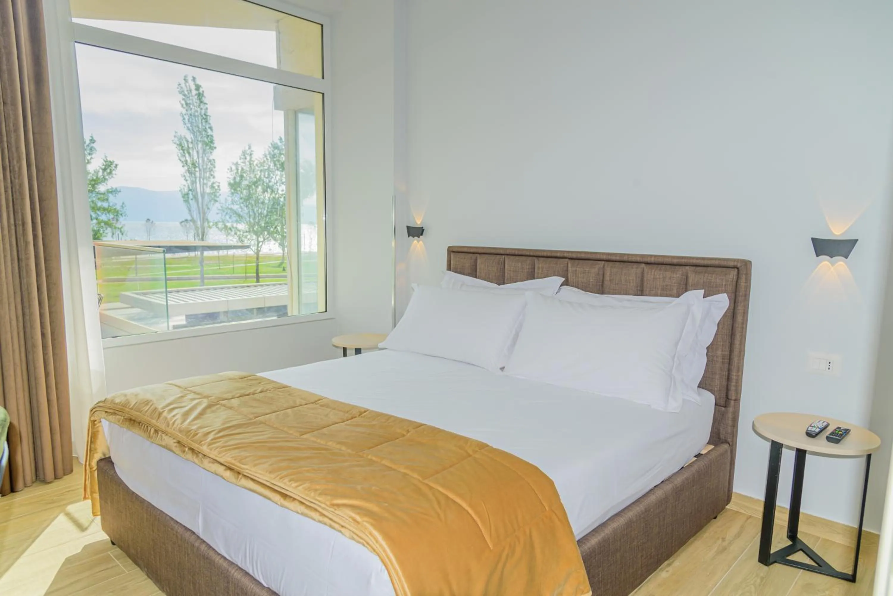 Bed in Palm Side Hotel