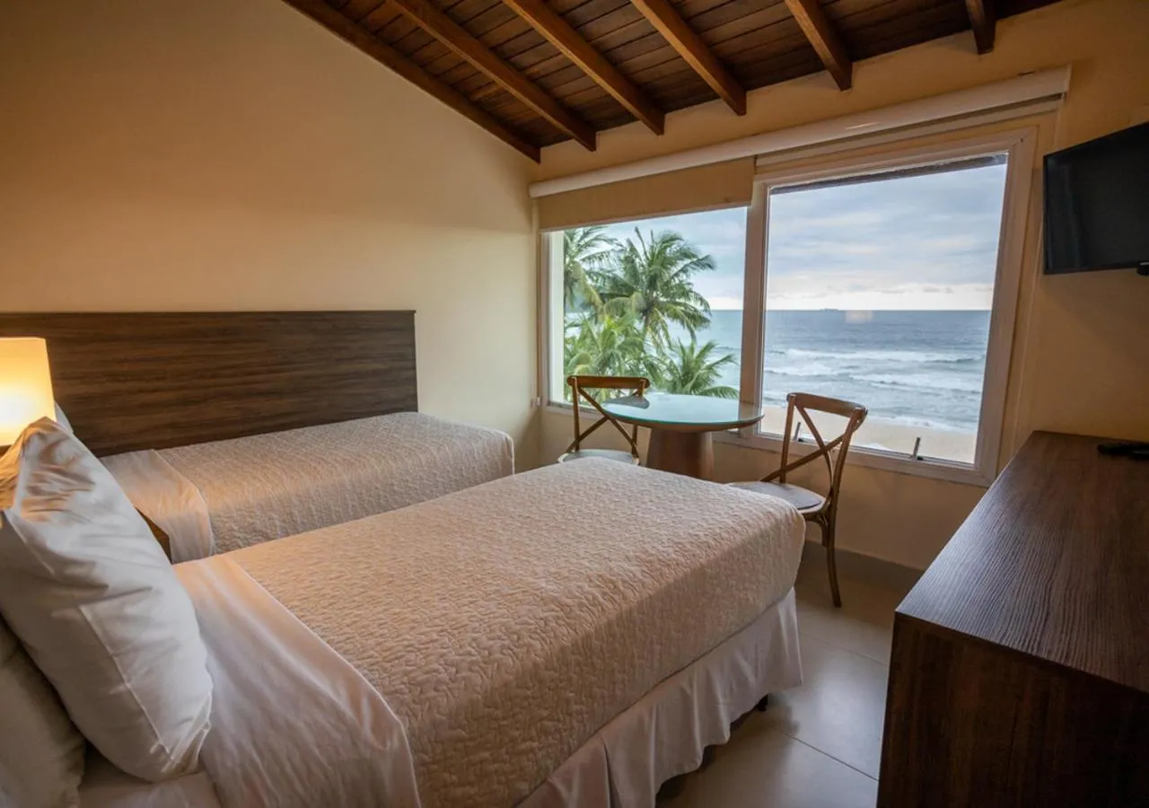 Bed in Amora Hotel Maresias