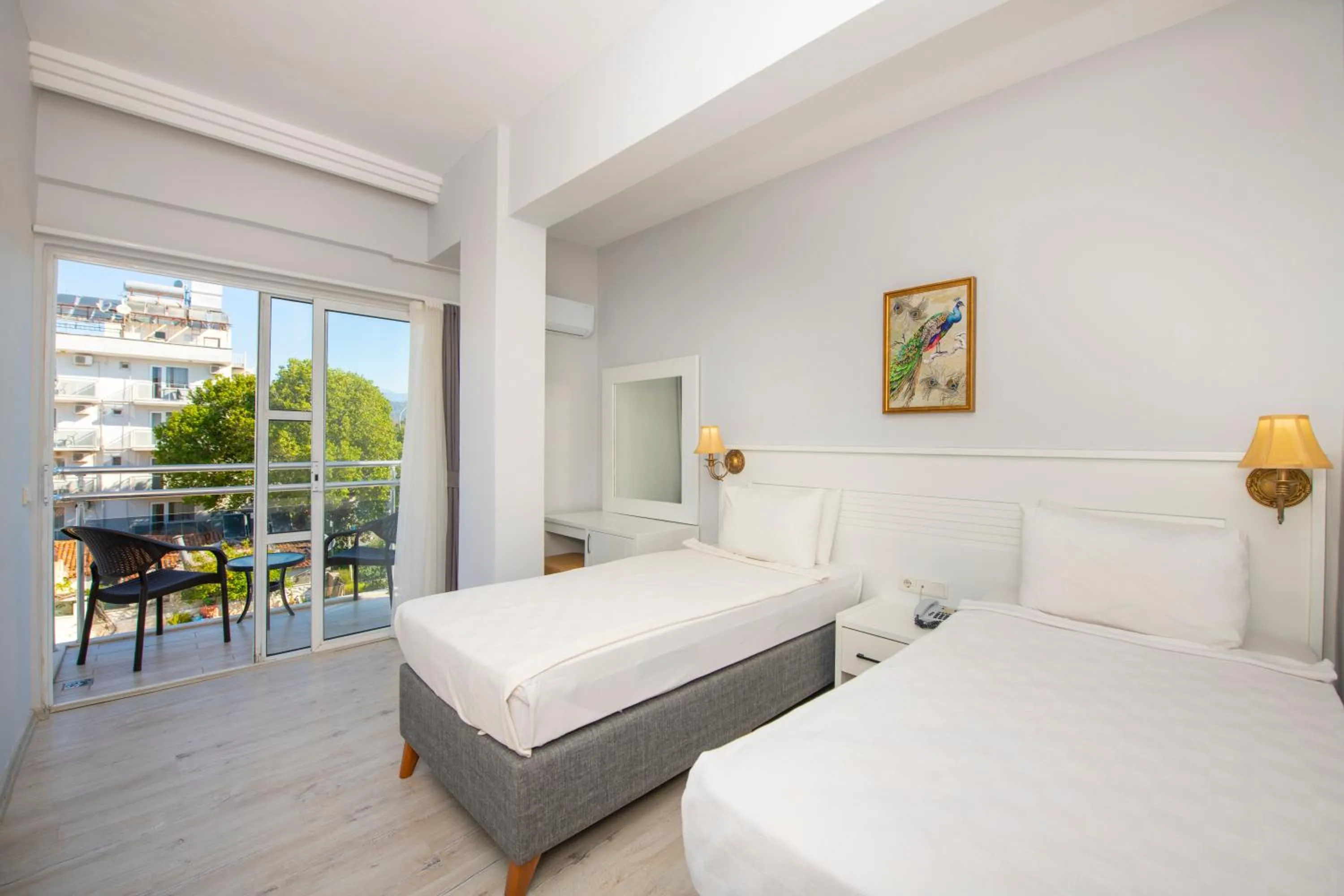 Bed in Mia Casa Hotel