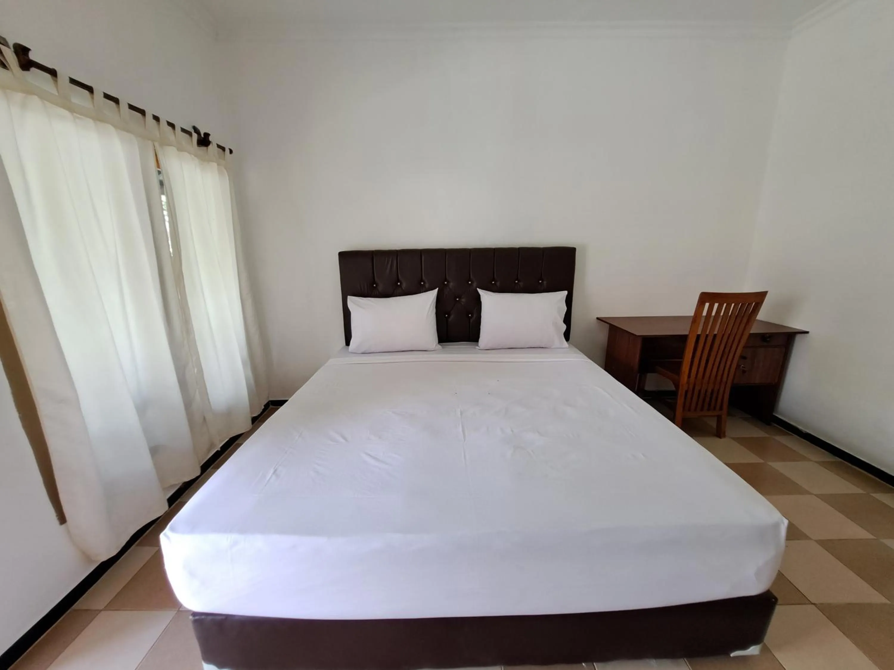 Bed in Surfers Beachfront Lombok