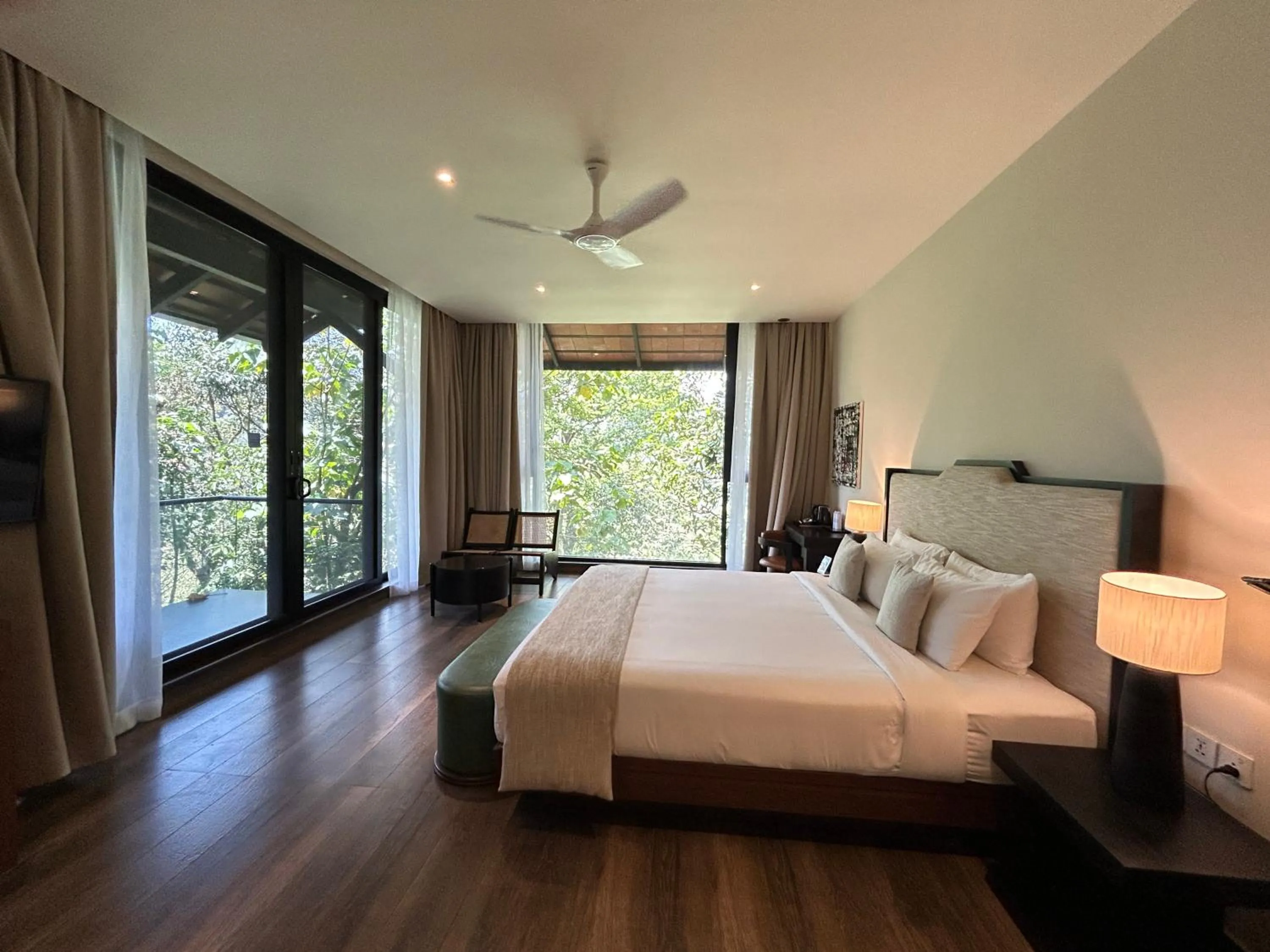 Bed in Flora Vythiri Resort Wayanad