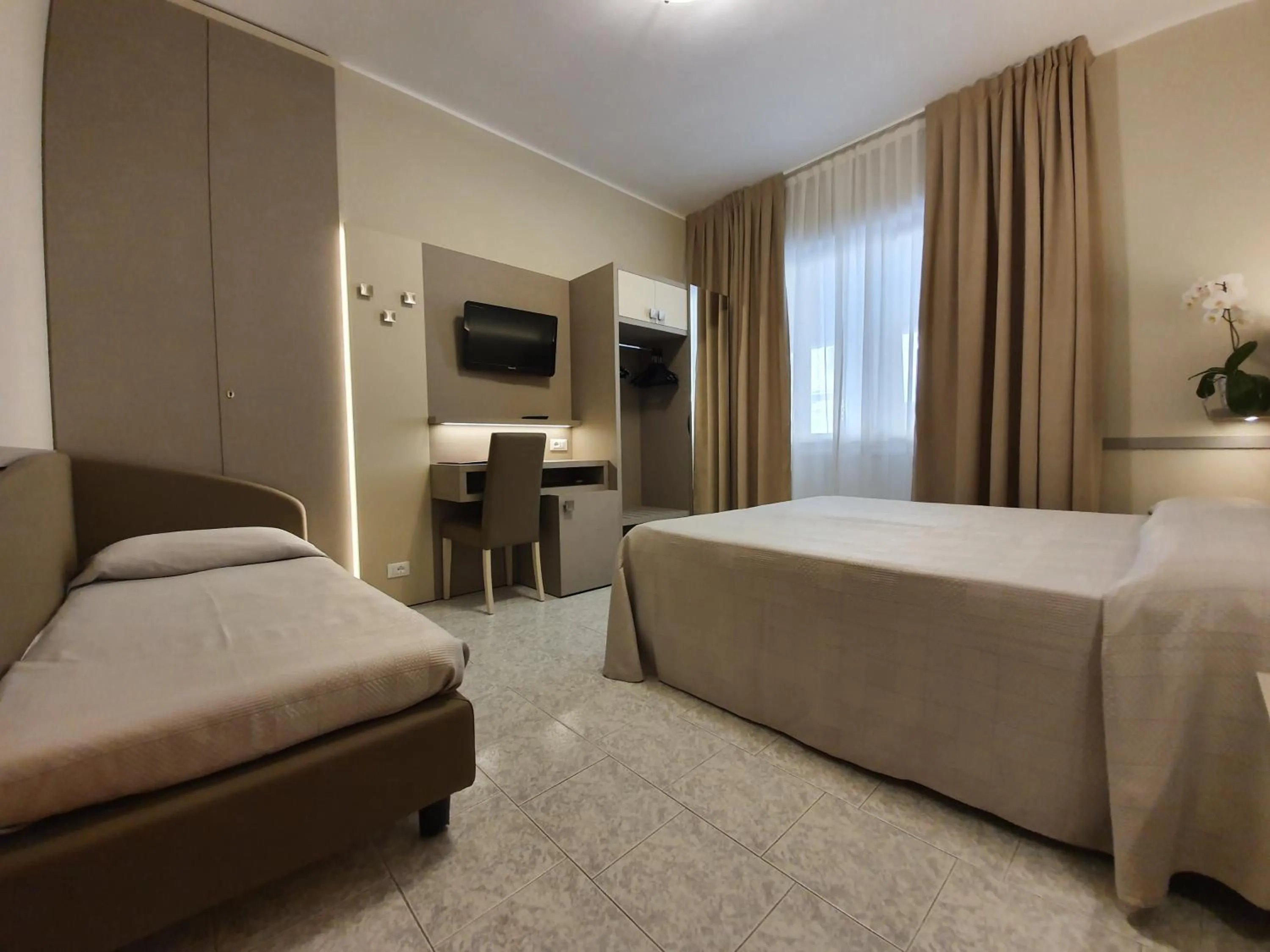 Bed in Hotel Corallo