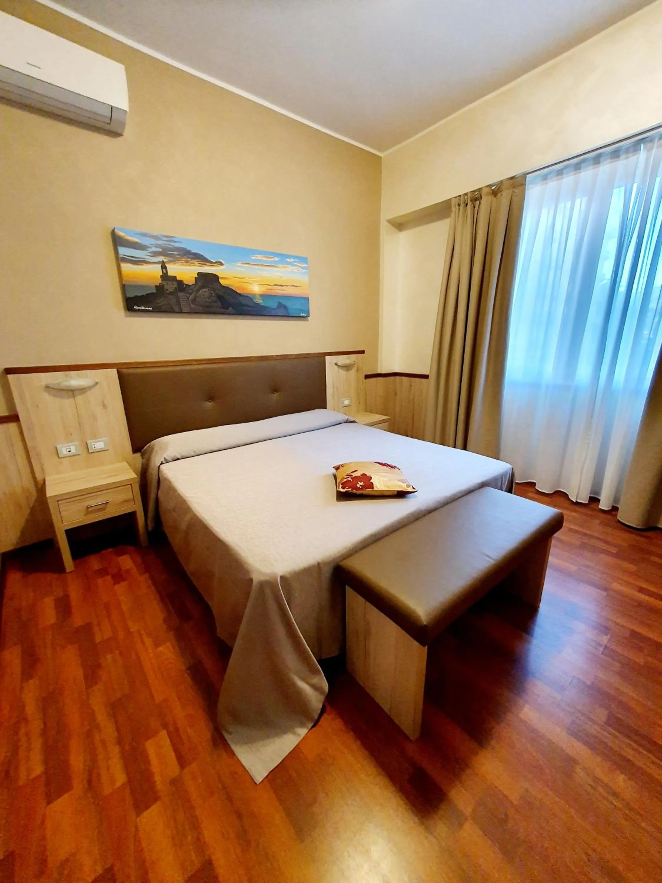 Bed in Hotel Corallo