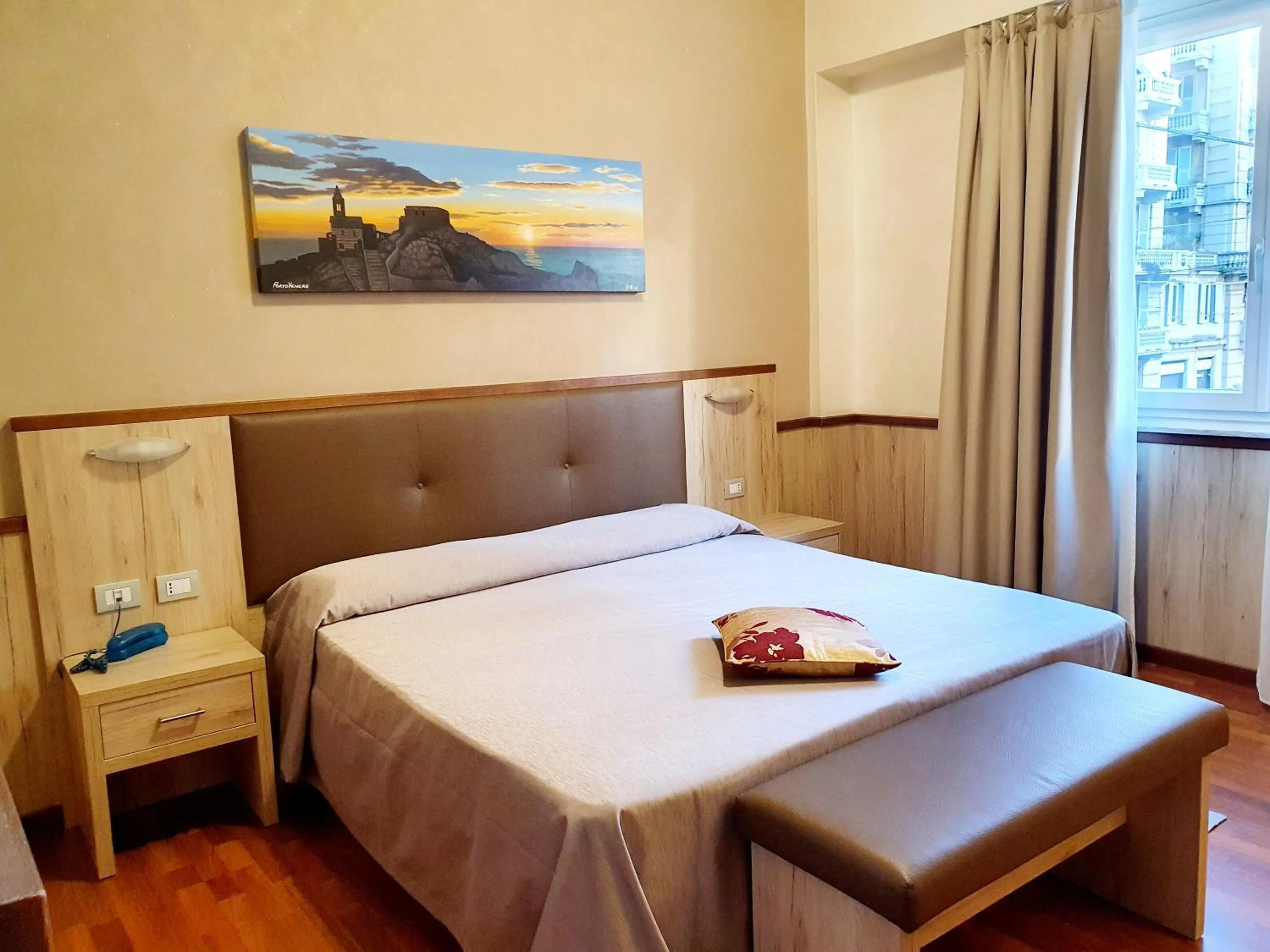 Bed in Hotel Corallo