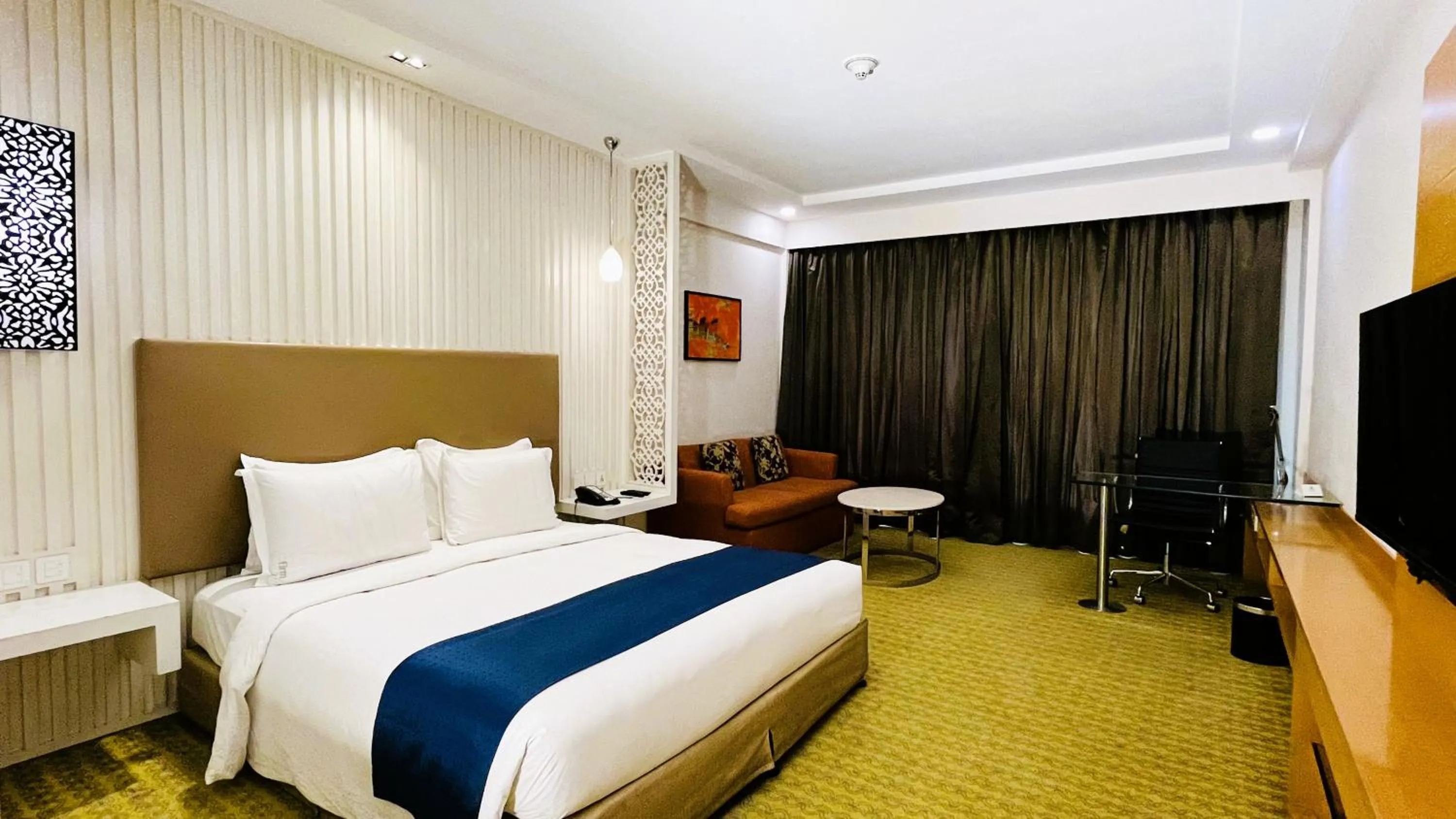Bed in Holiday Inn Amritsar Ranjit Avenue by IHG