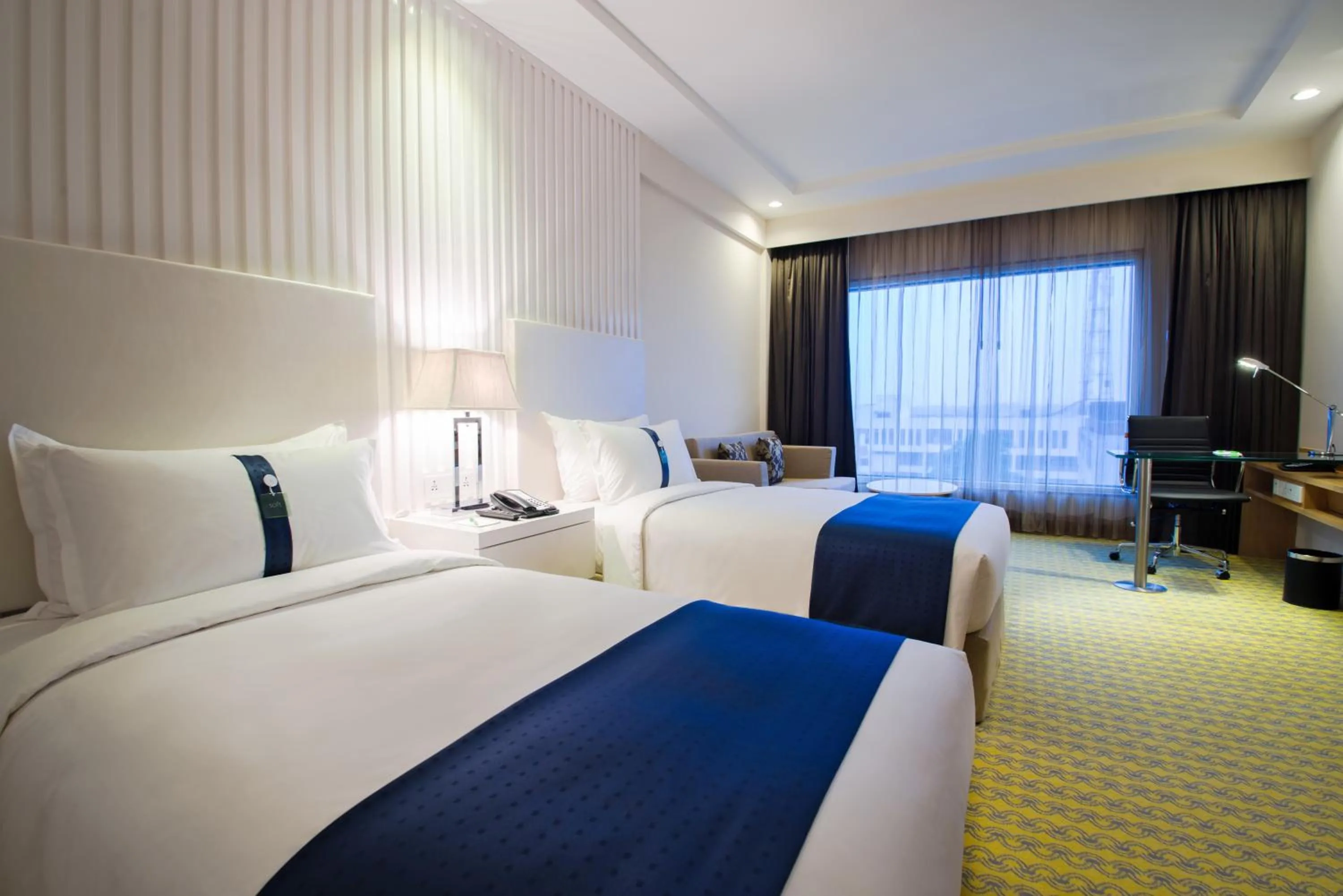 Bedroom, Bed in Holiday Inn Amritsar Ranjit Avenue by IHG
