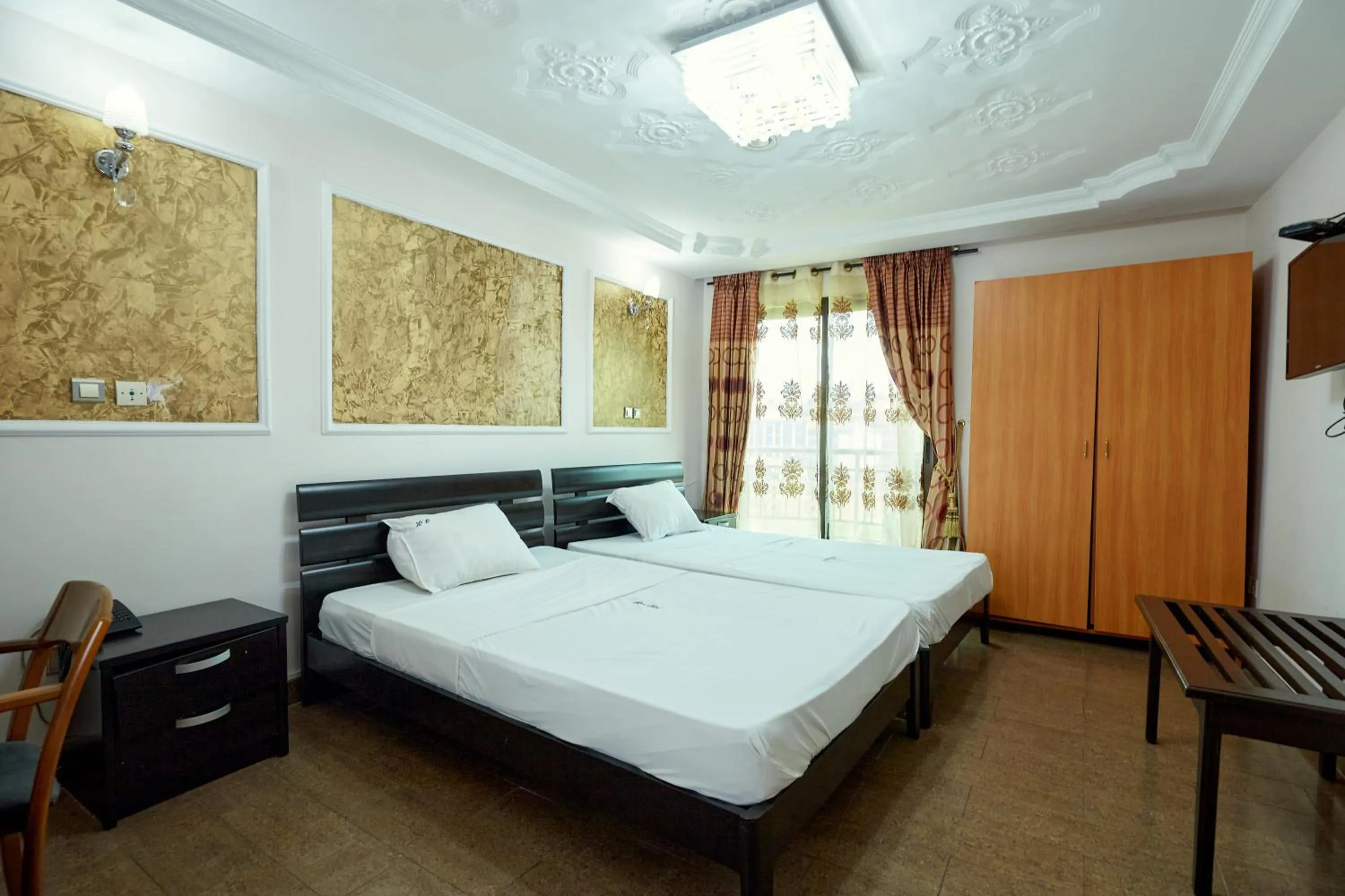 Bed in FELICIA HOTEL YAOUNDE
