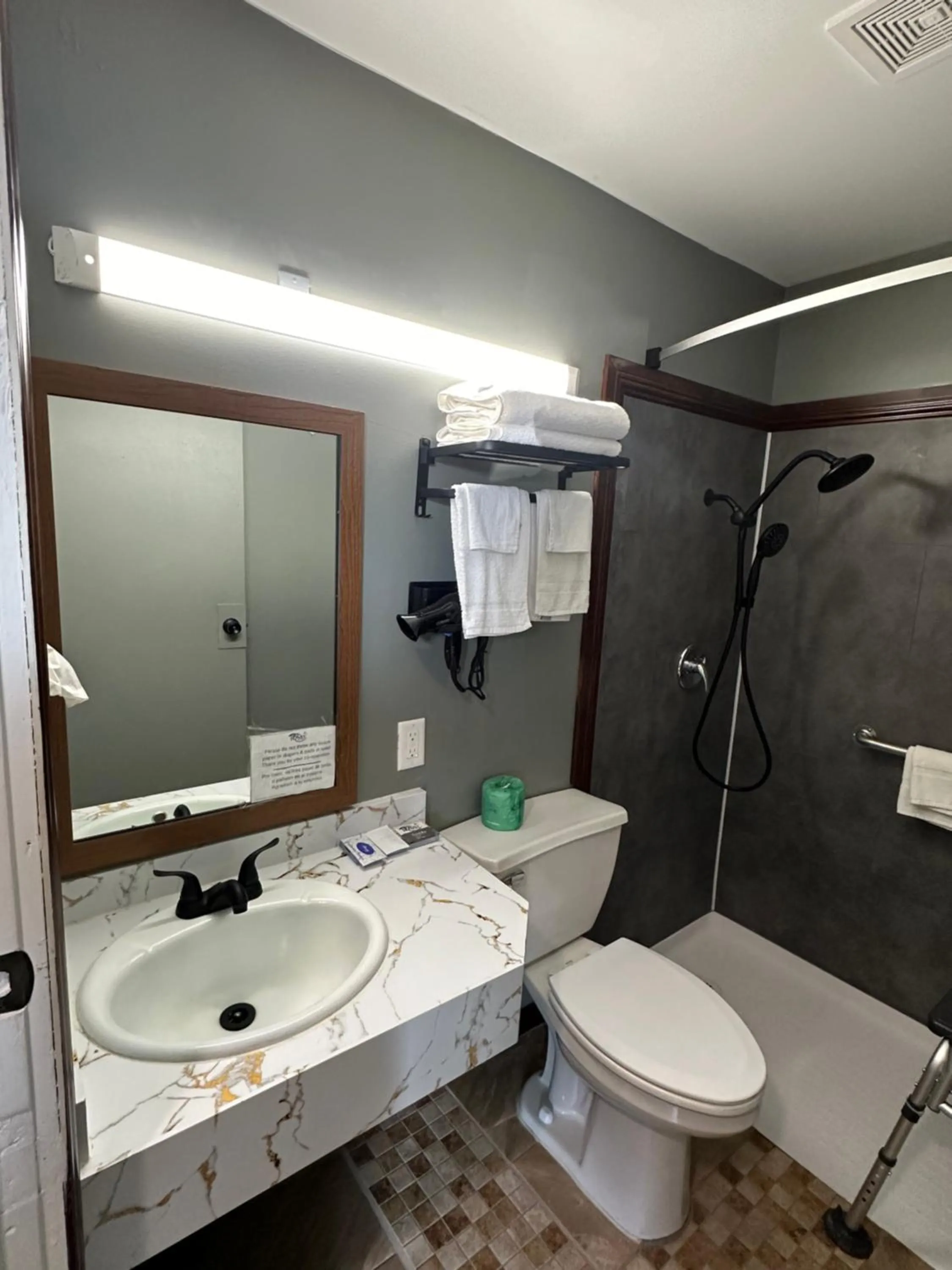 Shower in Travel Inn & Suites