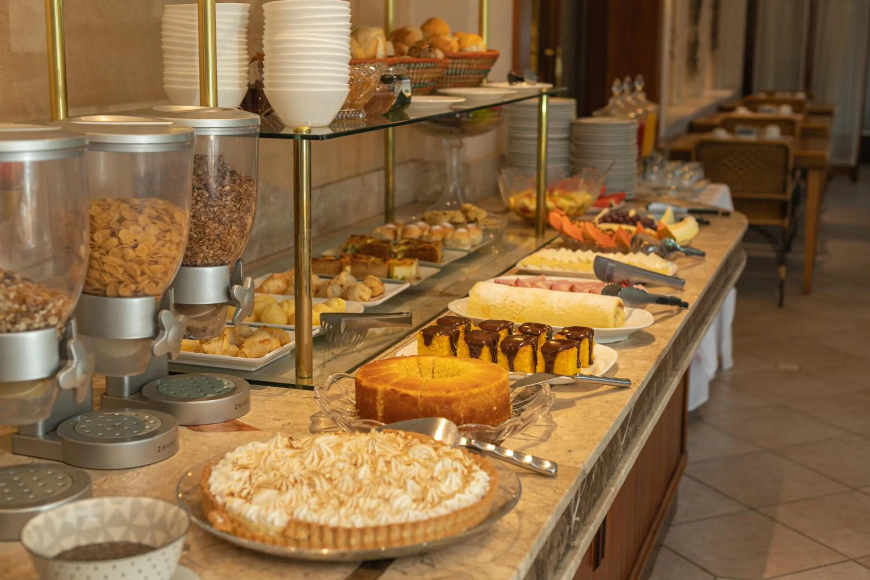 Buffet breakfast in Le Suisse Elegance Hotel