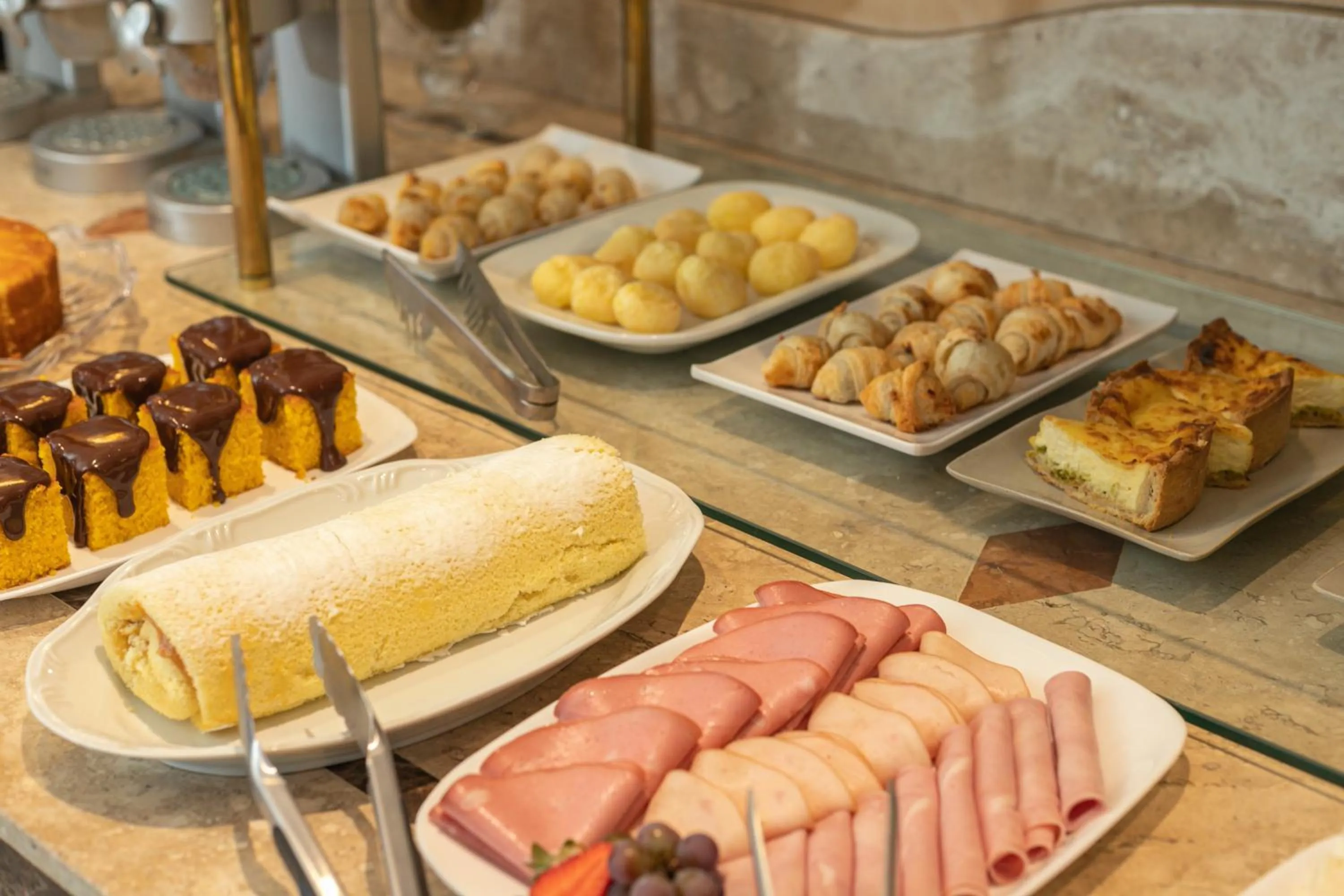 Continental breakfast in Le Suisse Elegance Hotel